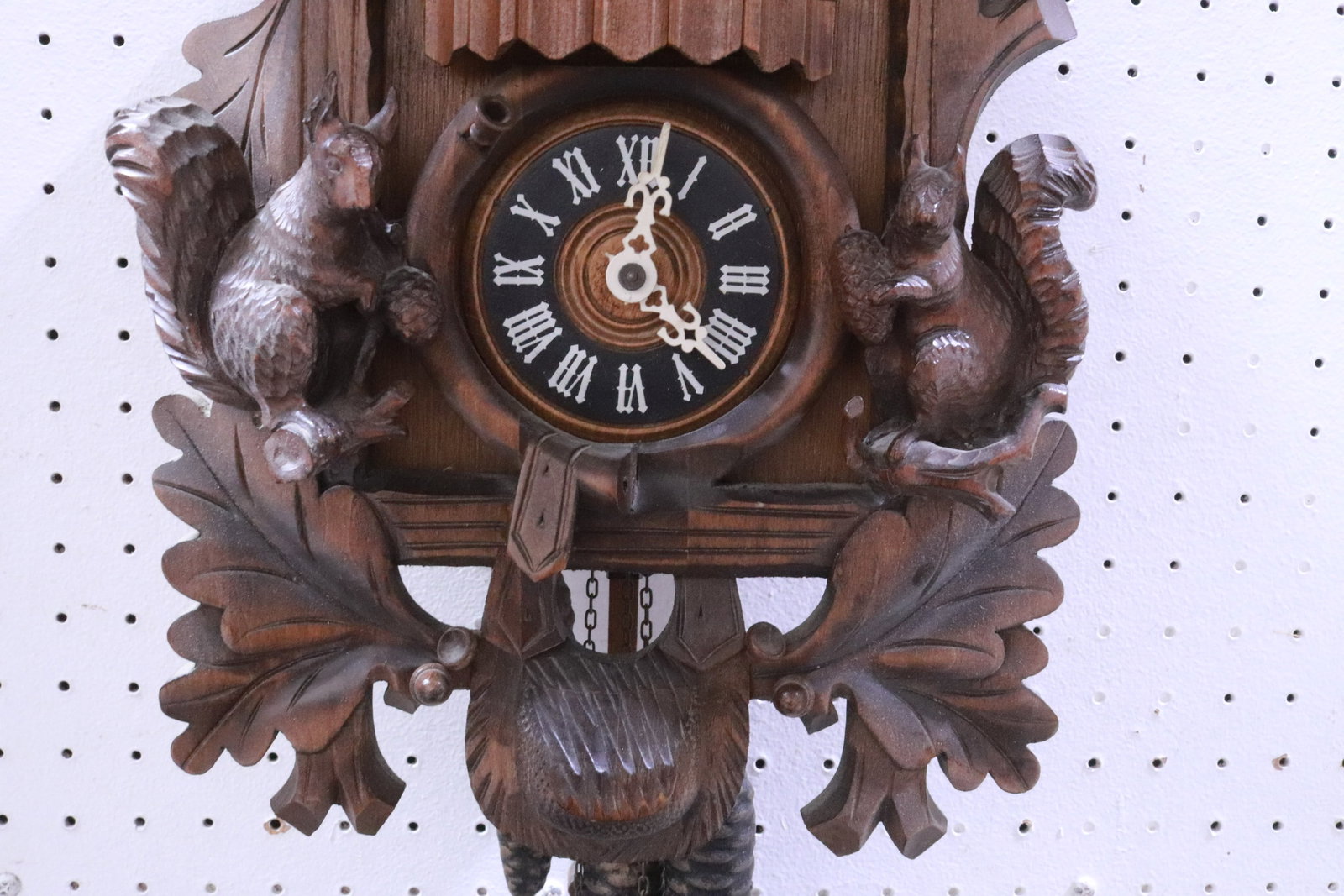 A fine carved cuckoo clock - 4