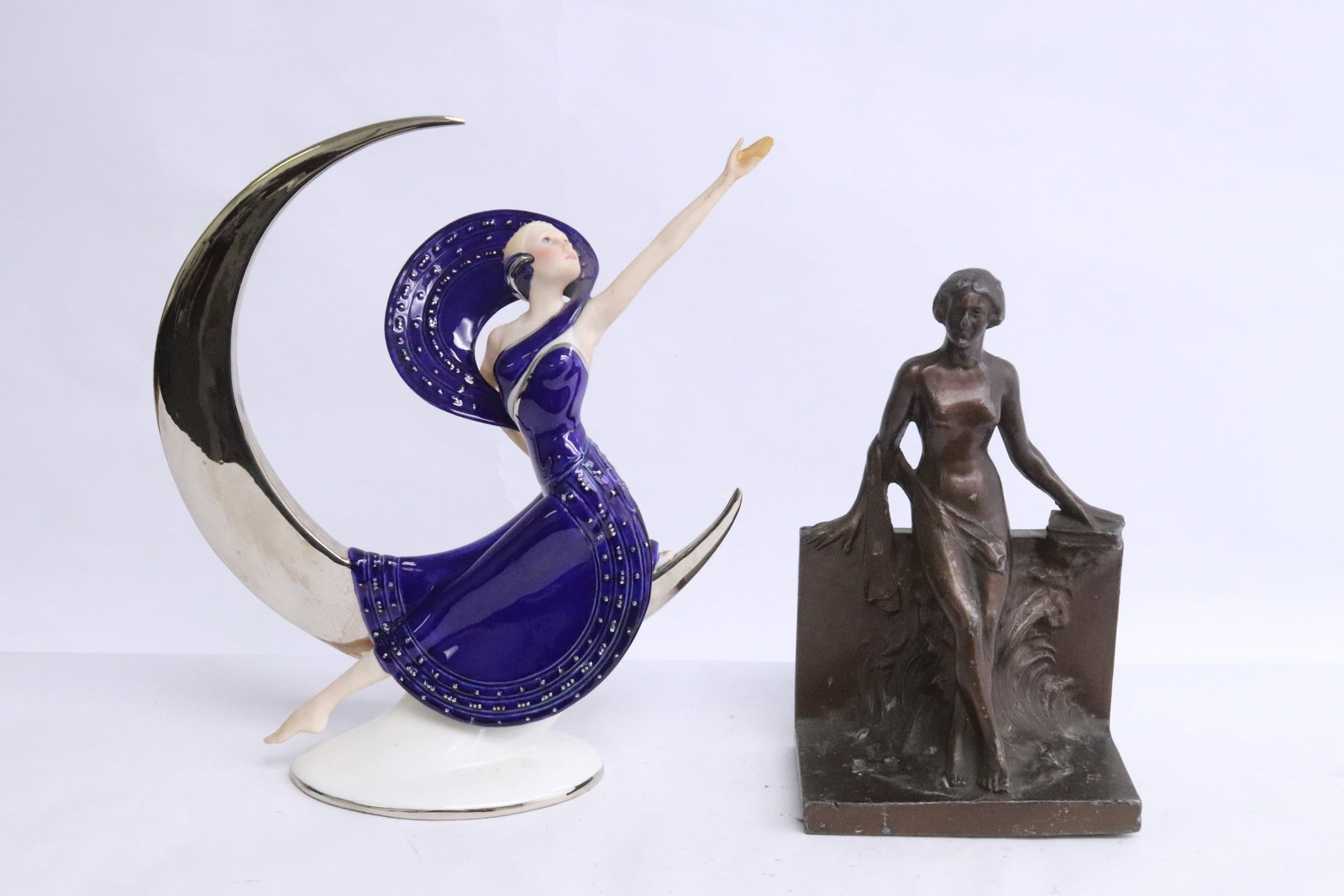 a deco style porcelain figure, & a single bookend: 2 items; a deco style porcelain figure (9.6"H), and a single bookend (7.35"H)