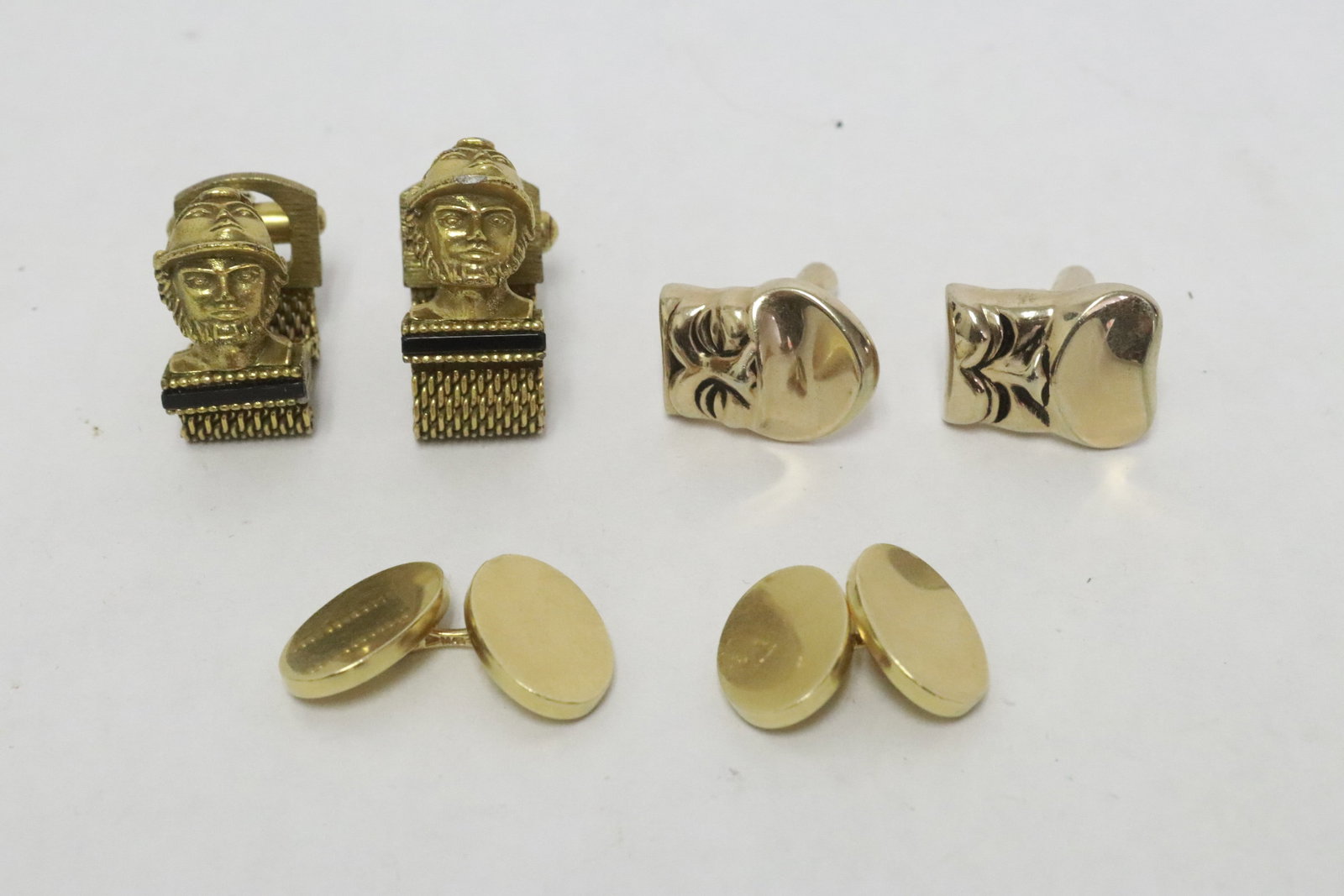 3 pairs cufflinks: 3 pairs cufflinks (0.75"x0.5" - 1.33"x0.55") ; one depicting Trojan motif
