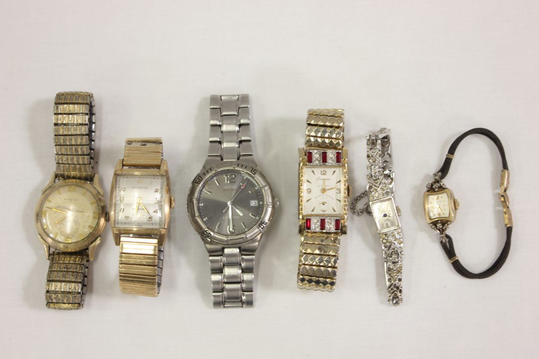 4 man's watches, and 2 woman's watches: 4 man's watches; 2 Wittnauer, Guess, and Lucerne, and 2 woman's watches