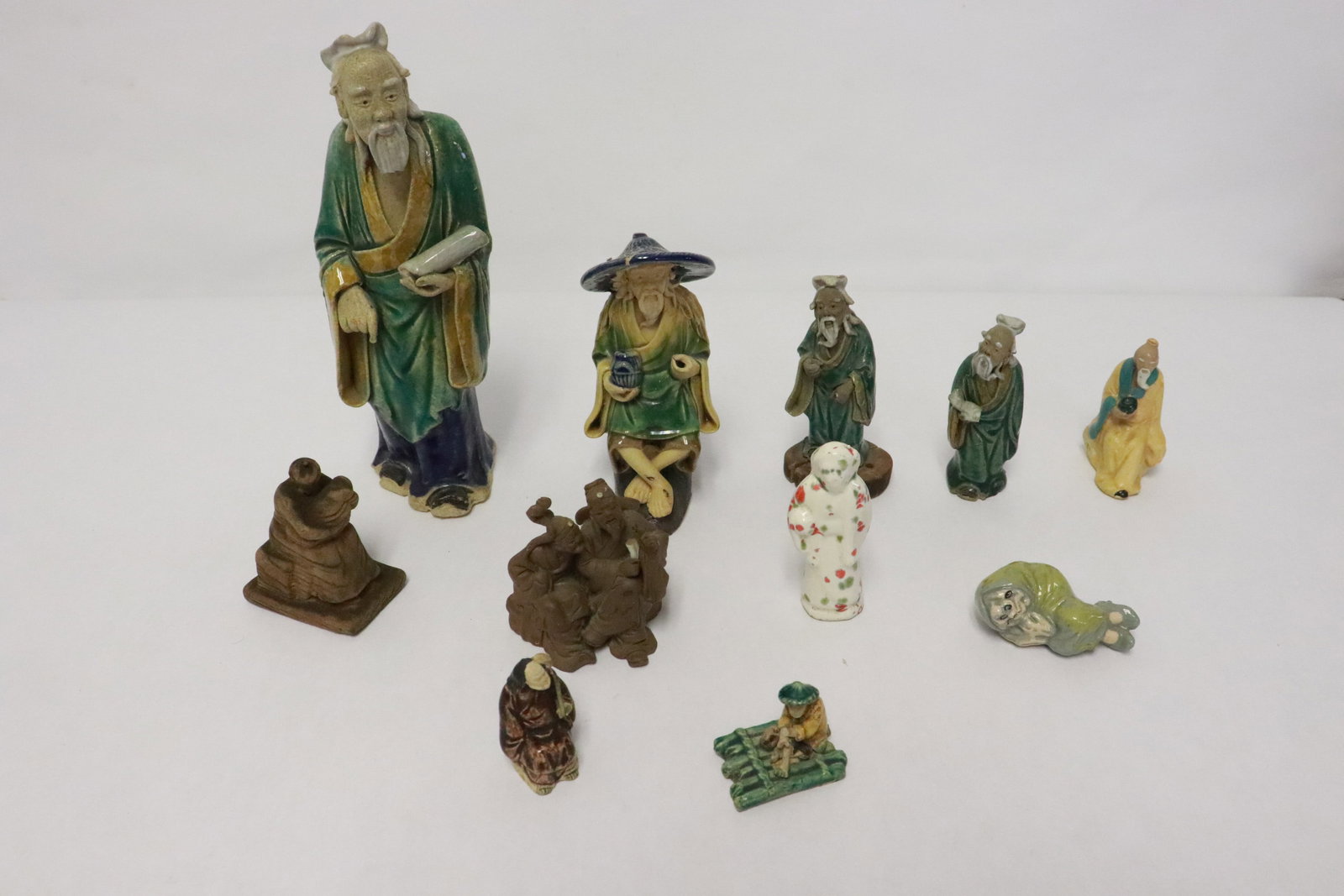 11 vintage Chinese mud men: 11 vintage Chinese mud men, 1.3"H - 7.6"H