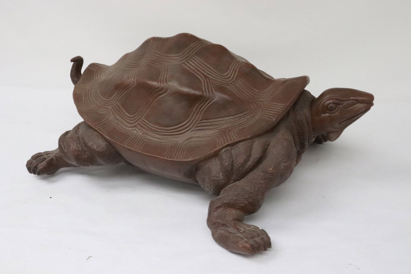 A massive Yixing sculpture of turtle: A massive Yixing sculpture of turtle, one leg repair, 10.5"x25.9"x18.8"