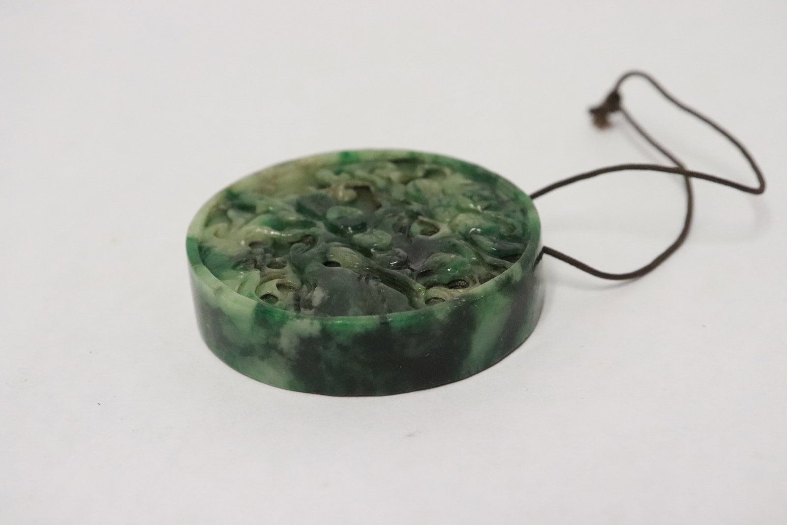 A jadeite like round disc - 2
