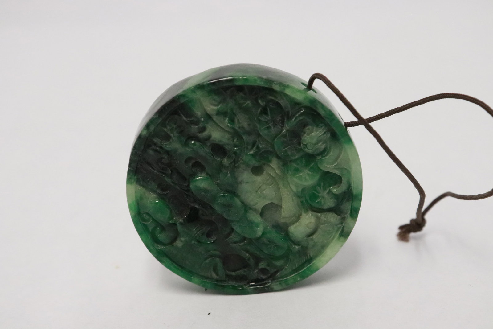 A jadeite like round disc - 3