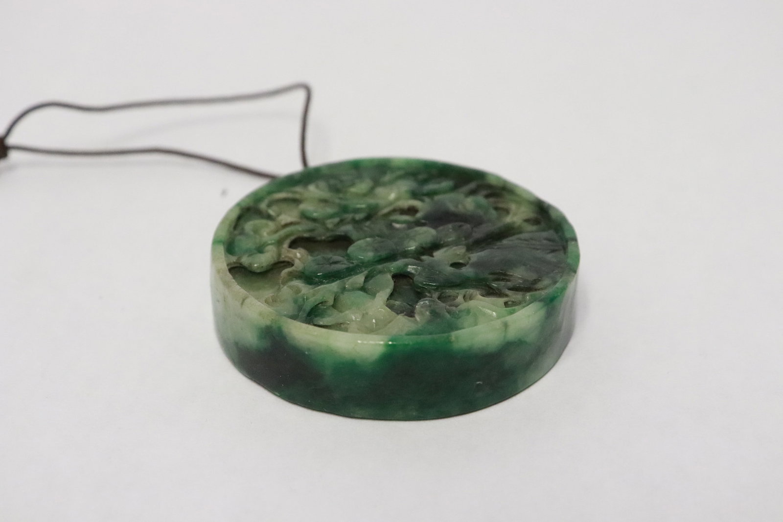 A jadeite like round disc - 4
