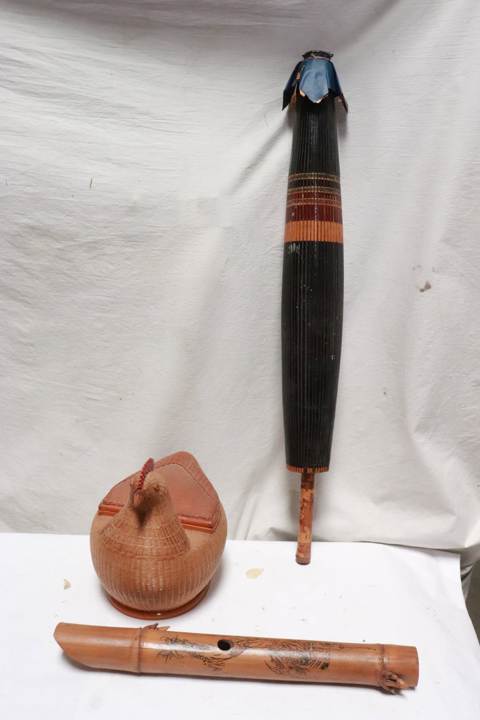 umbrella, bamboo box, & a bamboo music instrument (1 of 8)
