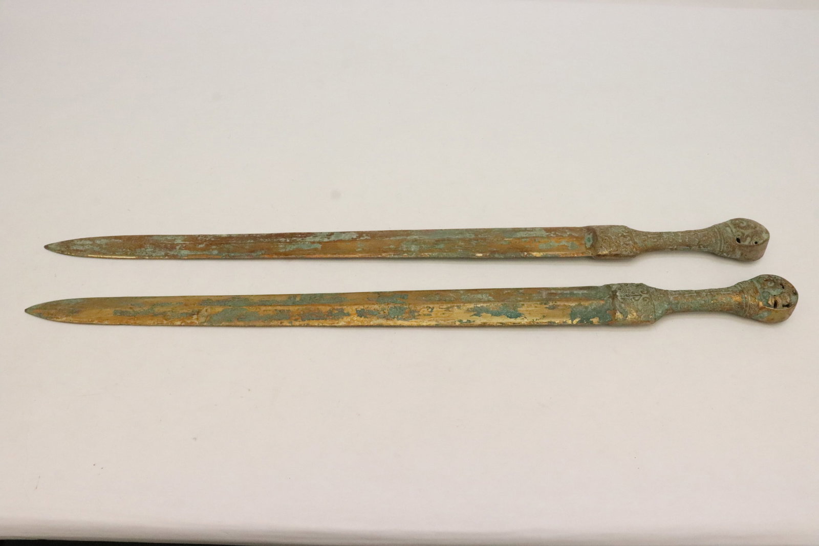 2 bronze swords: 2 bronze swords, 26.2L, 26.4"L