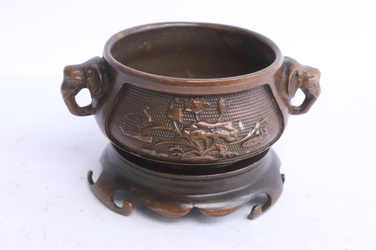 A bronze censer on bronze stand: A bronze censer on bronze stand, 2.5"x4.3"x3.3"