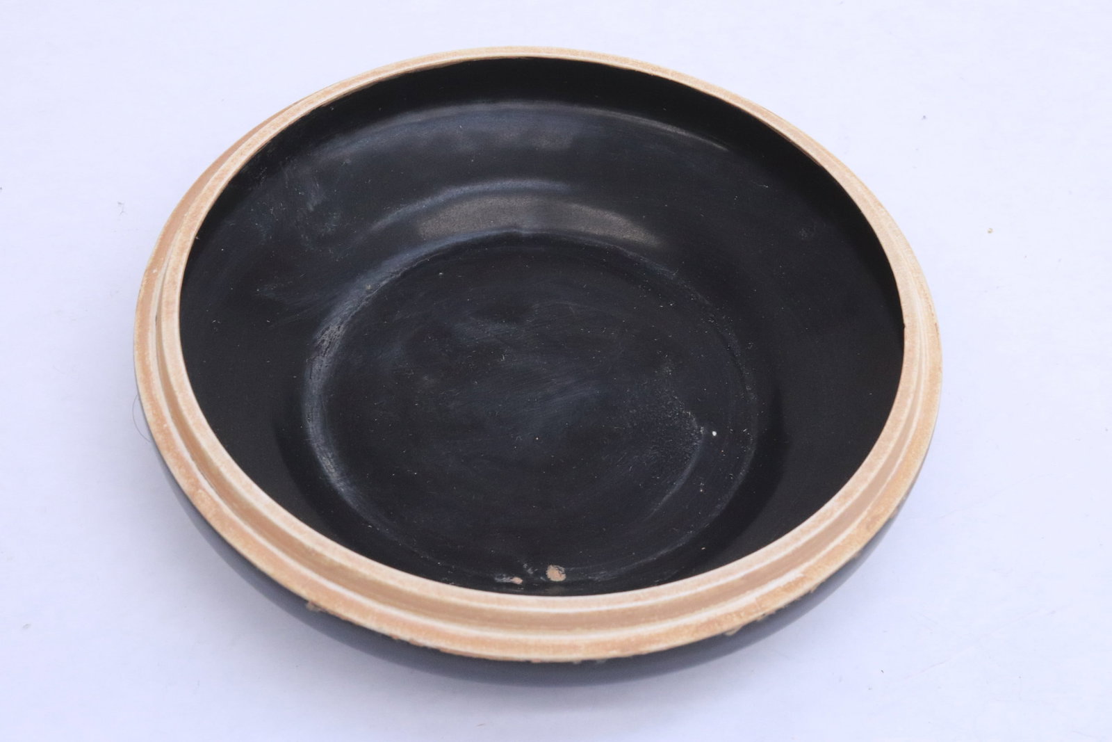 A brown glazed earthenware box - 4