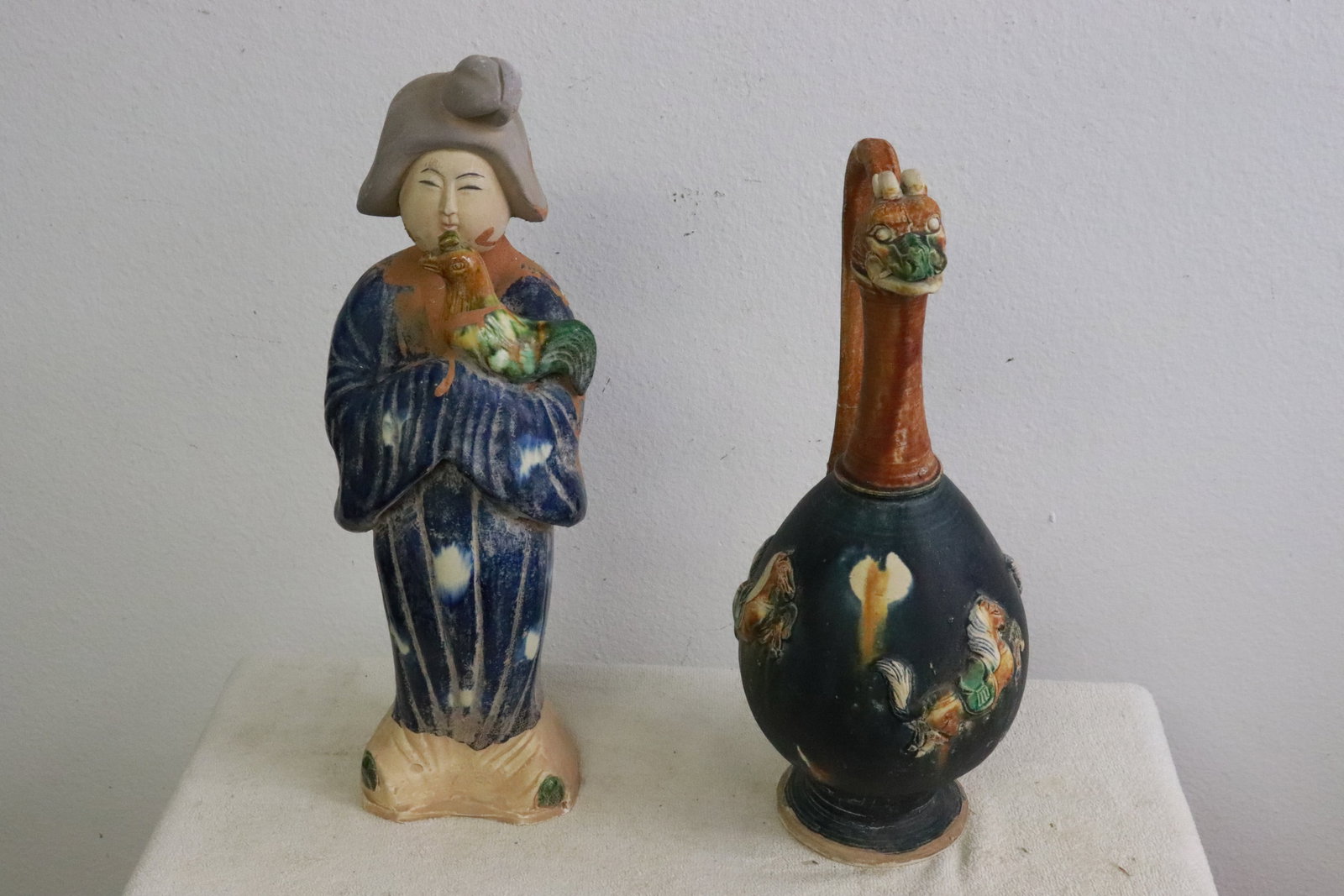 a sancai pottery ewer, and a sancai pottery figure (1 of 9)