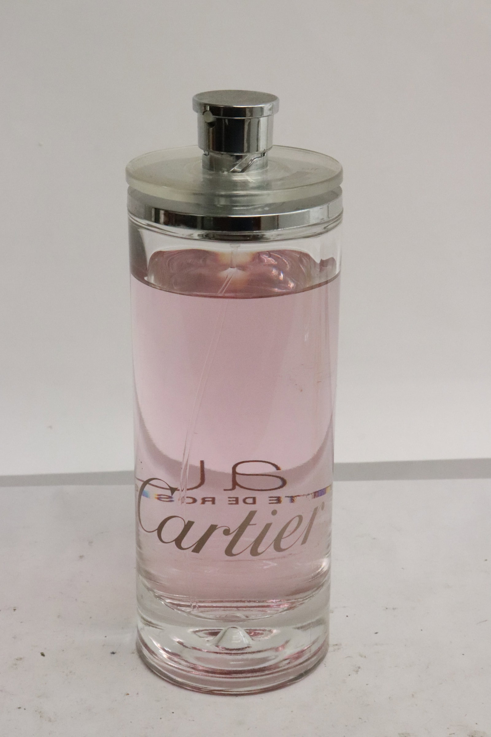 Cartier perfume/bottle lotion: Cartier perfume/bottle lotion, 6.5"x2.25"dia