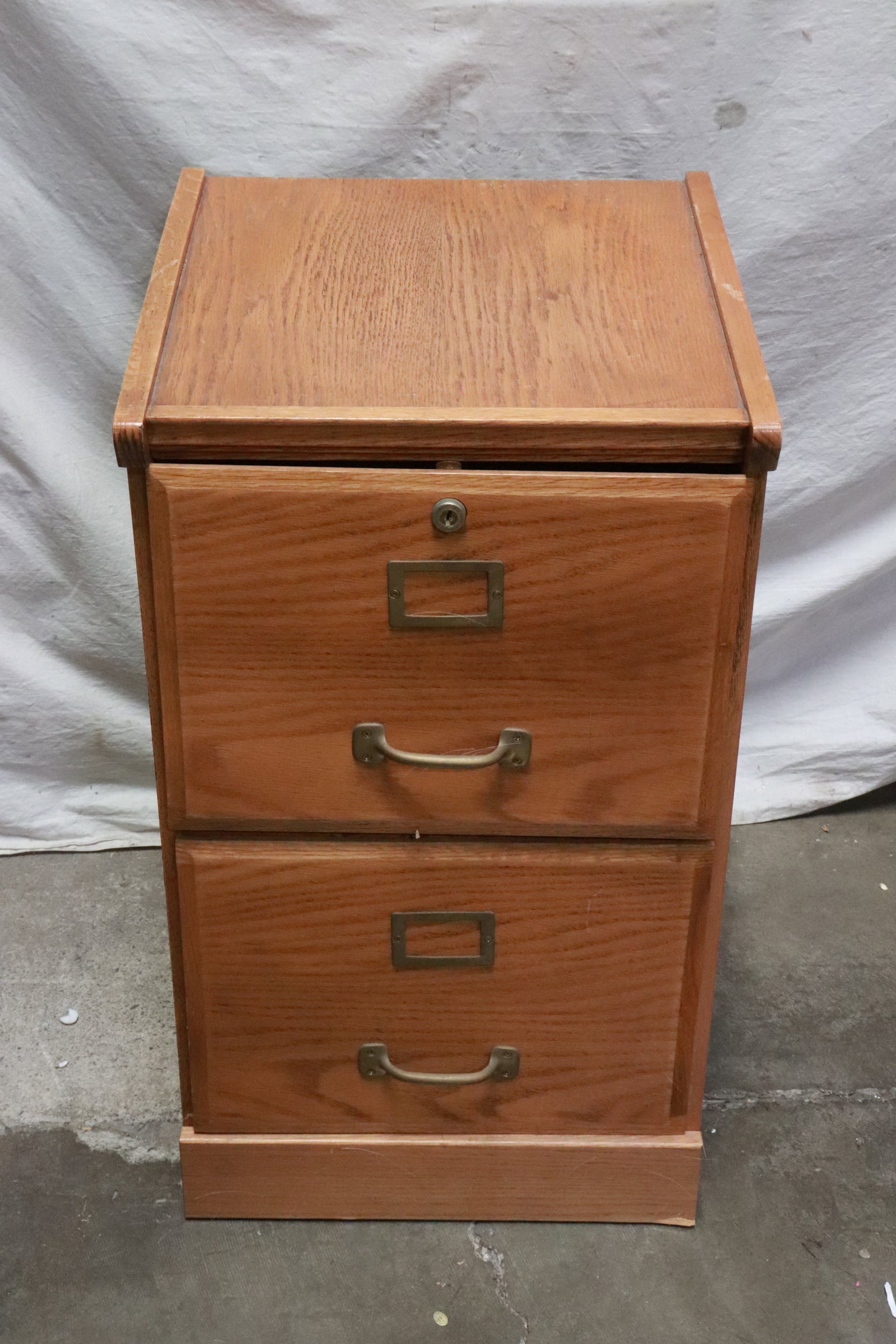 An oak wood file cabinet (1 of 6)