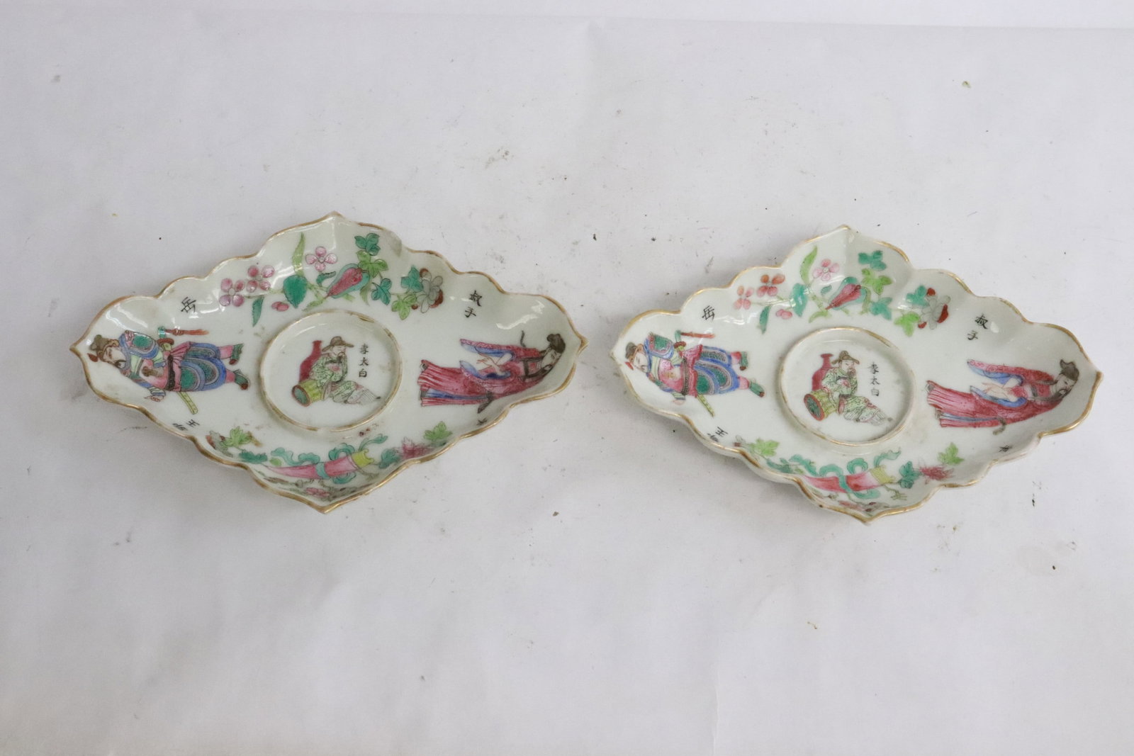 Pair Chinese antique famille rose cup holders: Pair Chinese antique famille rose porcelain cup holders, top edge flea bites, 1.15"x6.4"x4.35" ea