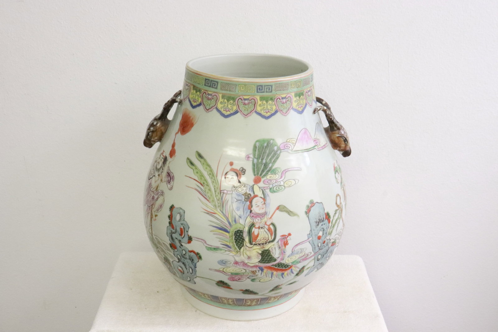 A massive famille rose porcelain jar: A massive famille rose porcelain jar with deer motif handles, 19.6"x16.75"dia