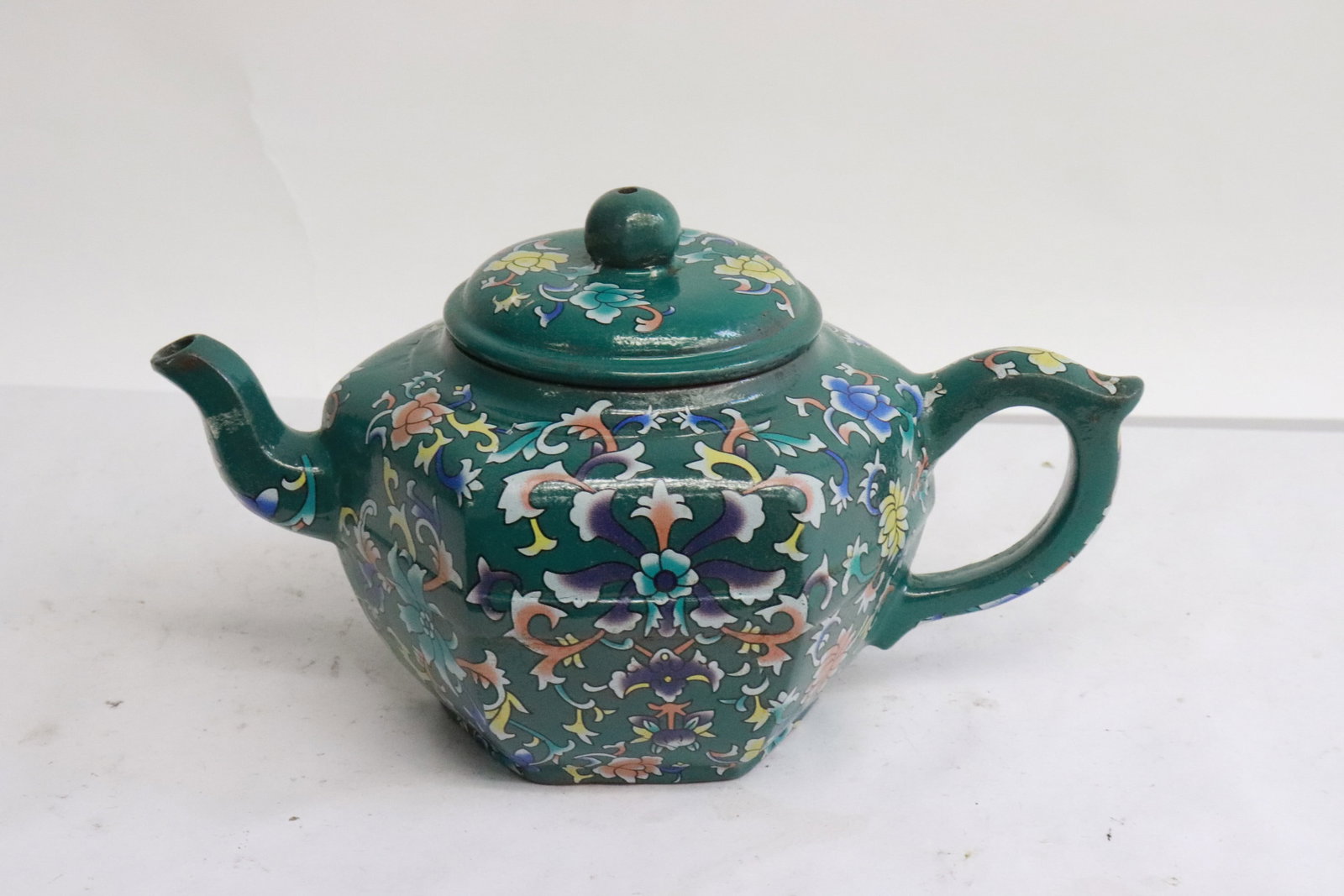 Yixing teapot with enamel decoration: Yixing teapot with enamel decoration, 4.4"x7.6"x4.6"