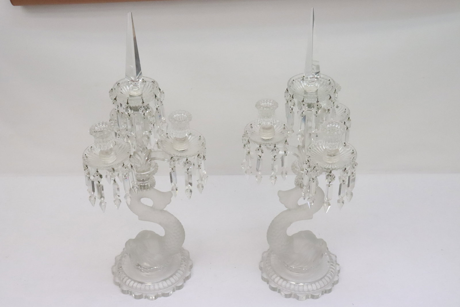 Pair important Baccarat crystal candelabra: Pair important Baccarat crystal candelabra with frosty base in dolphin motif, 23"H ea