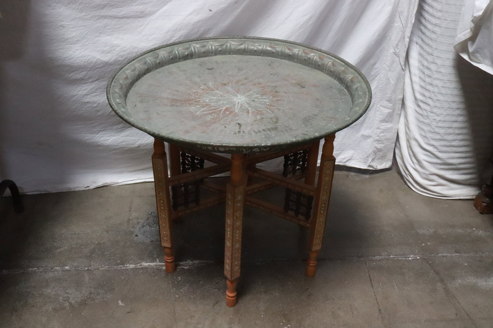 A Mid-Eastern copper platter: A Mid-Eastern copper platter (2.15"x25.9"dia) with beautiful inlaid stand
