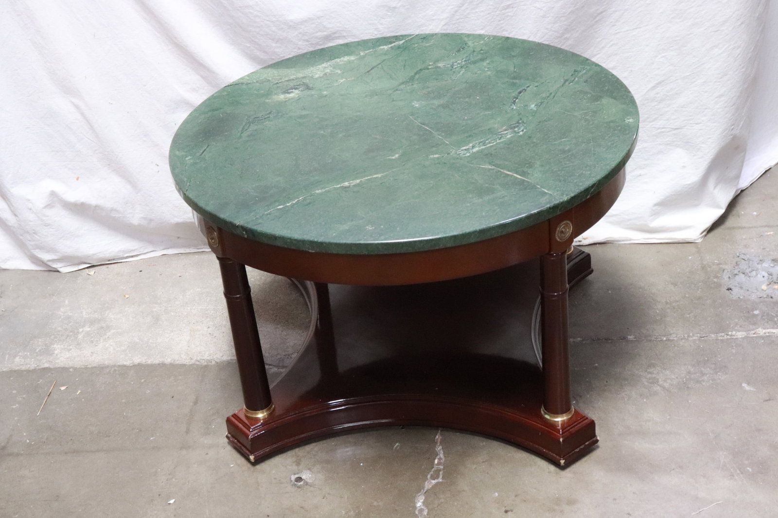 A marble top round low table - 2