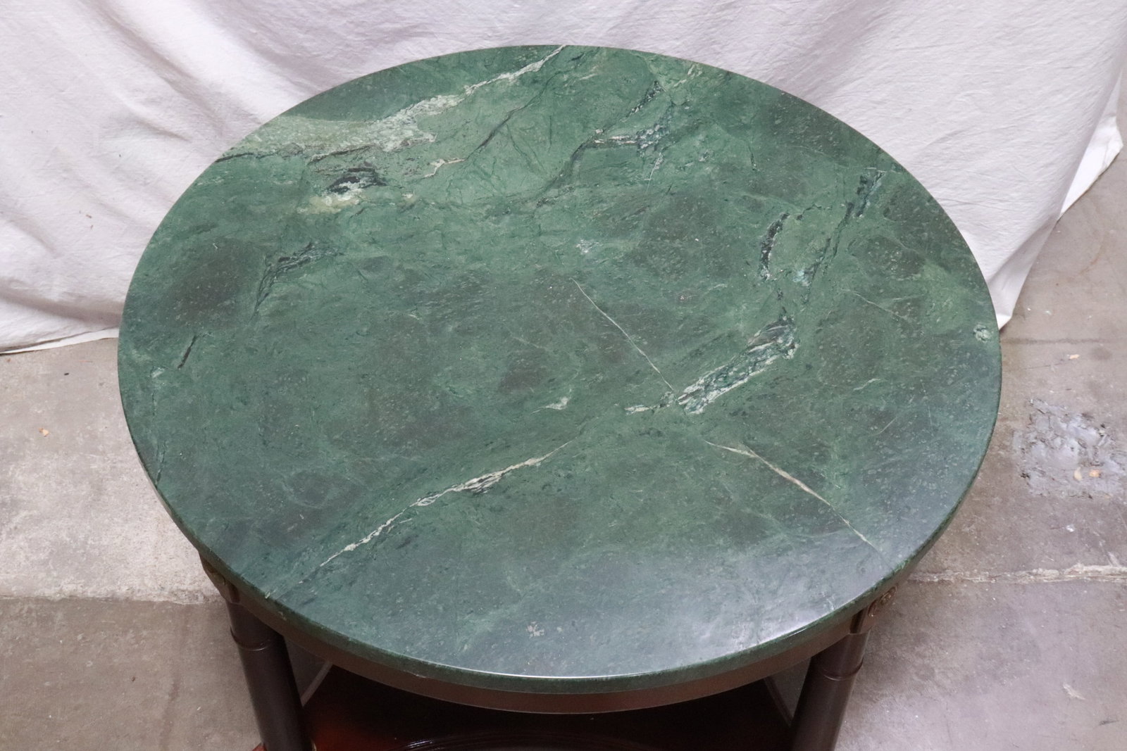 A marble top round low table - 3