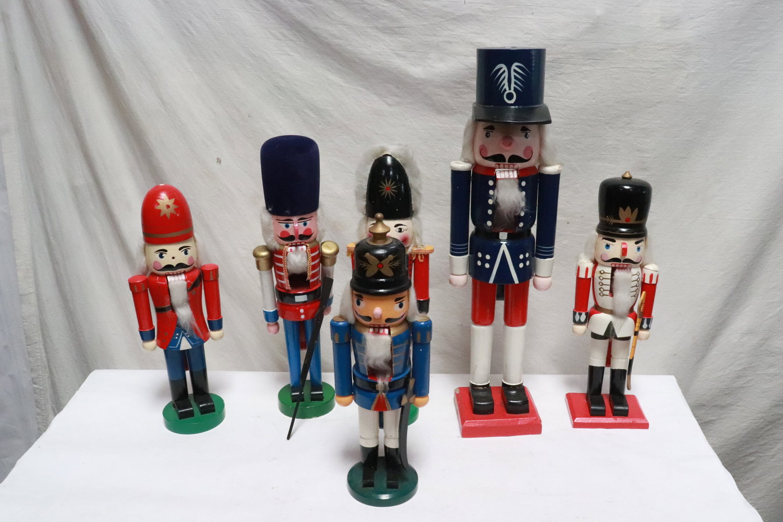 6 painted wood nutcrackers: 6 painted wood nutcrackers, 13.35"H - 20"H