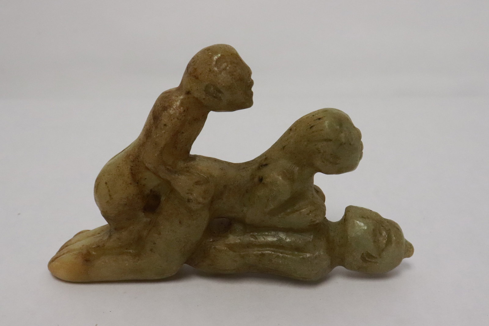 A large celadon jade carved ornament: A large celadon jade carved ornament, 3.4"H