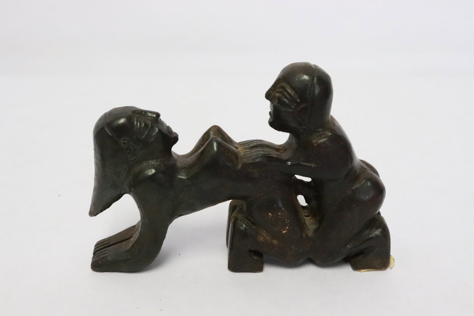 A green jade carved ornament: A green jade carved ornament, 2.9"H