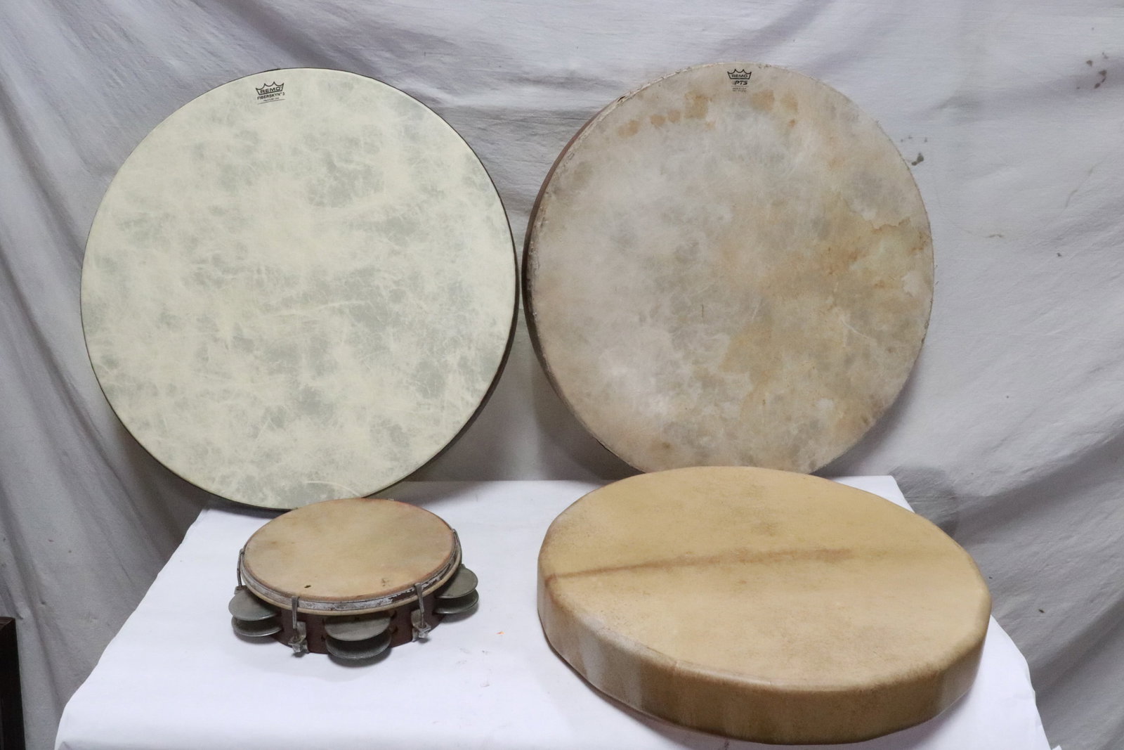 3 drums, and a pandeiro: 3 drums, and a pandeiro, 2.35"x10.8"dia - 2.6"x22"dia