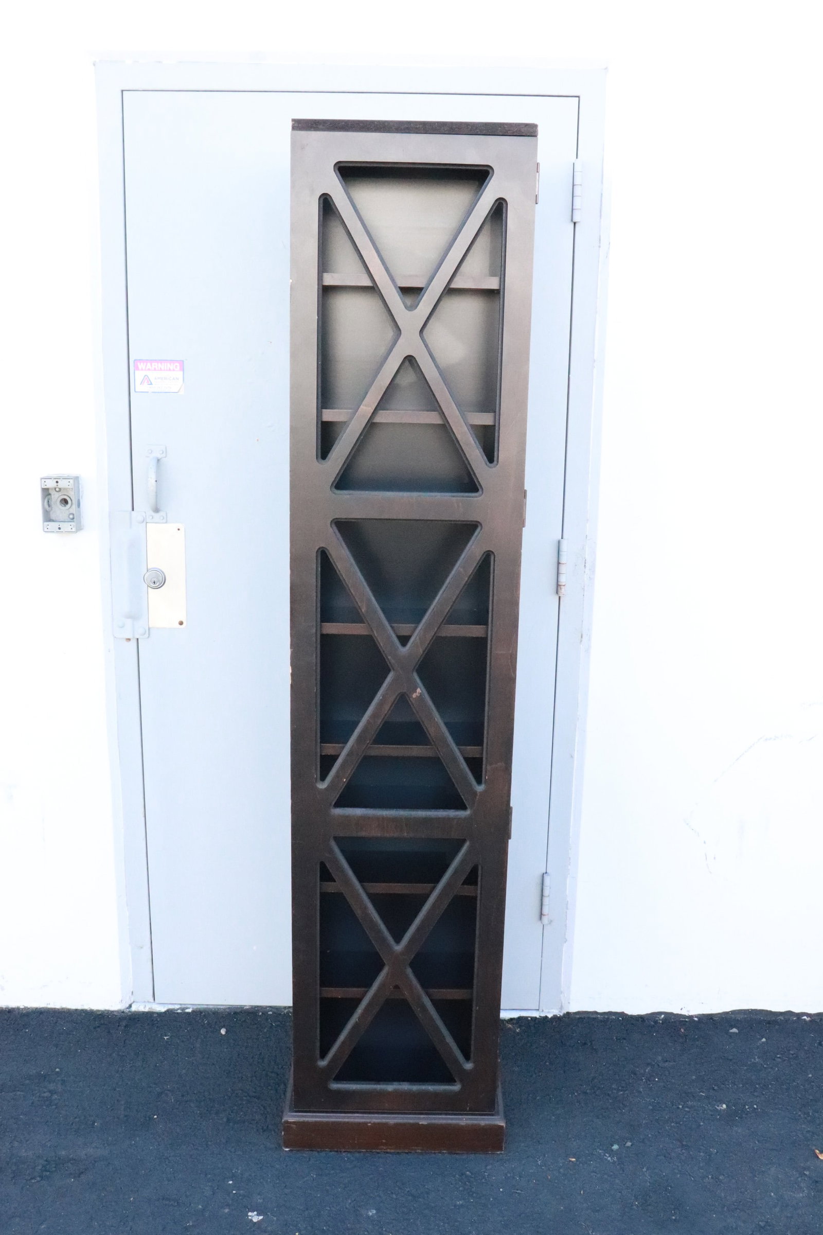 A DVD storage cabinet: A DVD storage cabinet, 73.8"x15.5"x14"