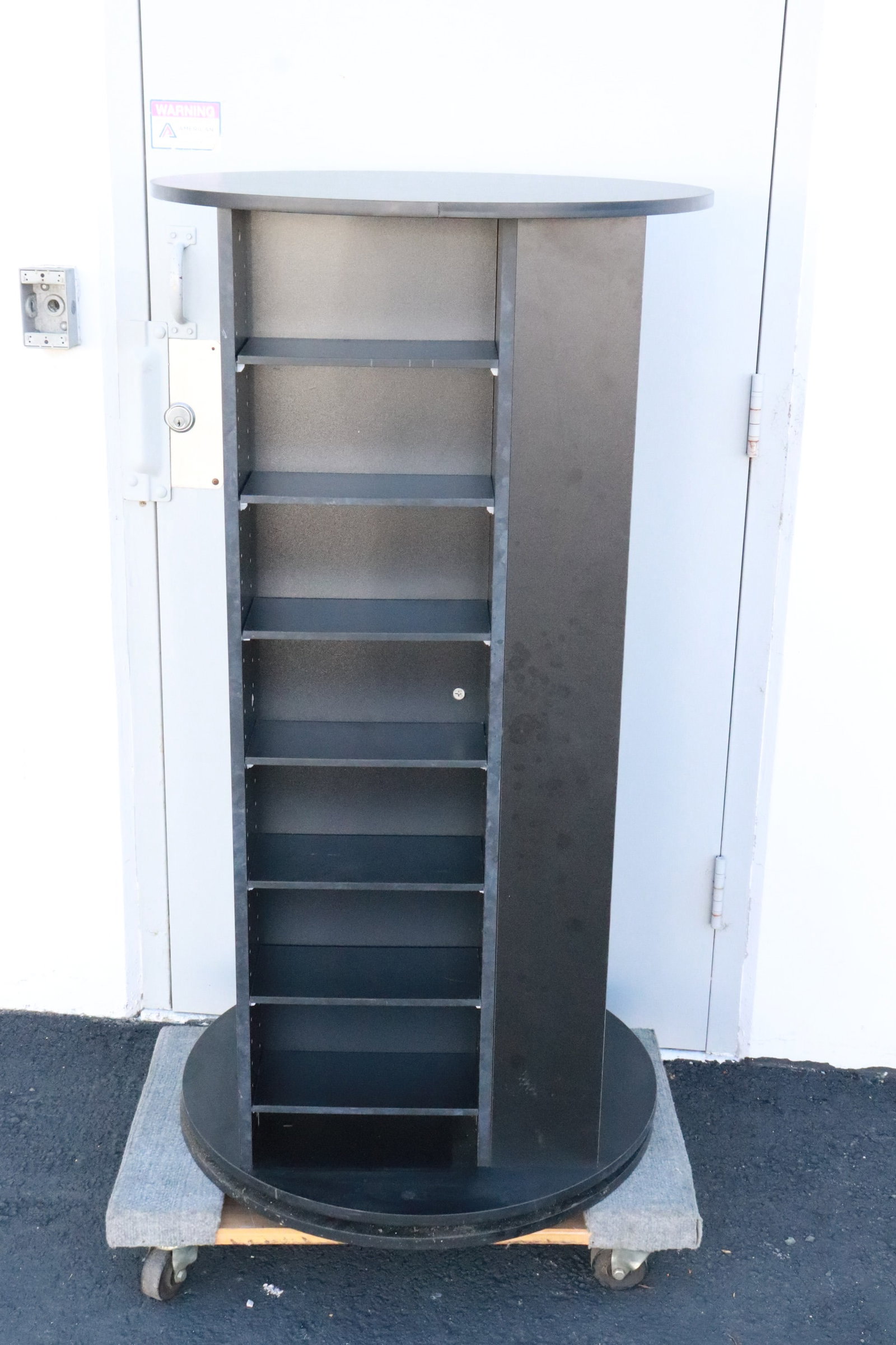 A CD storage cabinet: A CD storage cabinet, 50"x26.5"dia