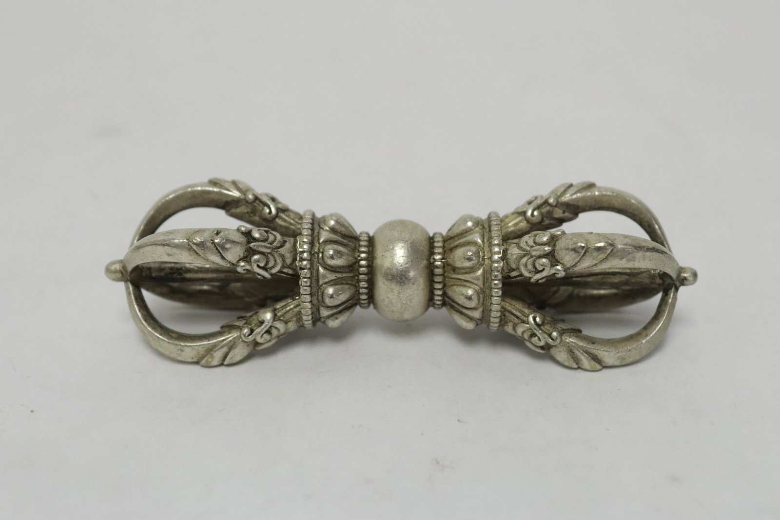 Tibetan white bronze religious relic (1 of 4)