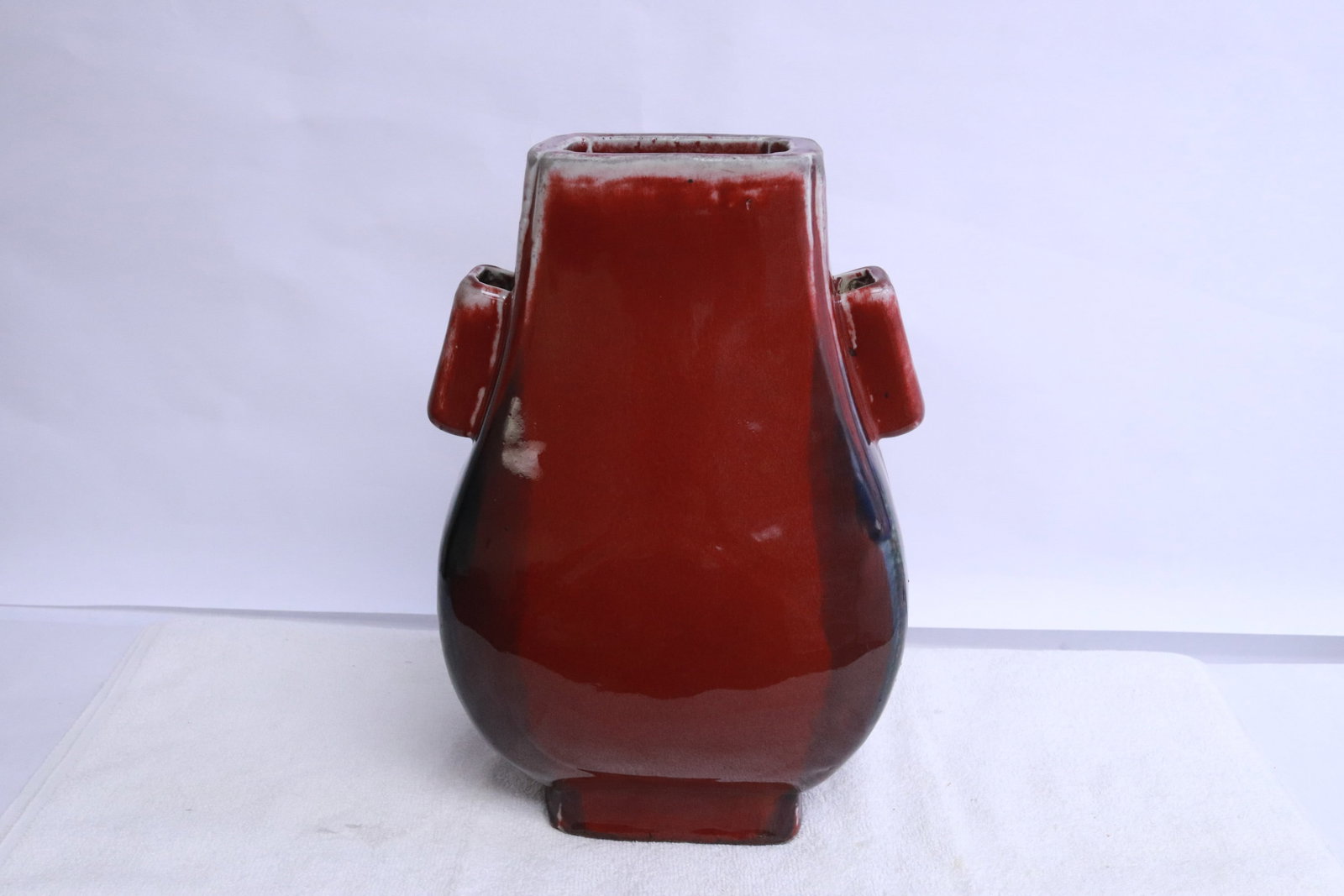Chinese 19th c. flambe oxblood hu vase, Guangxu period: Chinese 19th century flambe oxblood hu vase, Guangxu period, 11.3"x7.85"x6.3"
