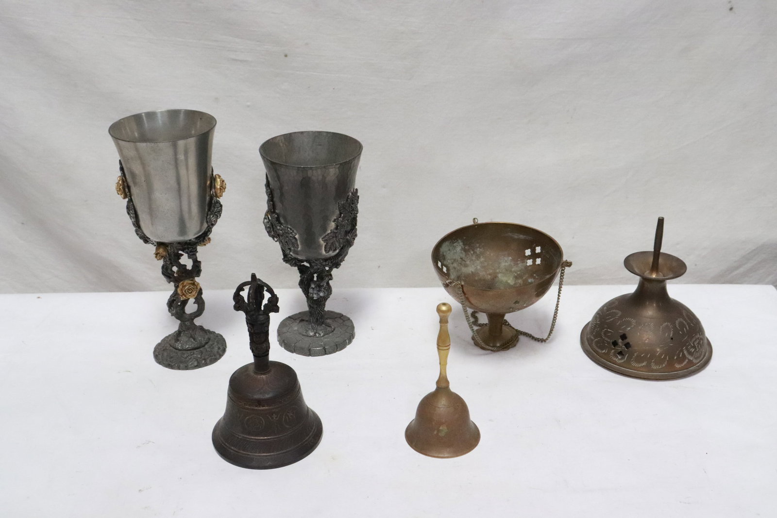 2 pewter goblets, 2 bells, and a brass censer (1 of 6)