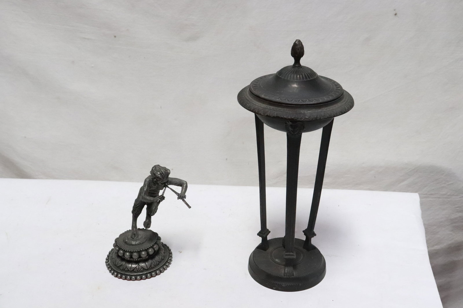 pewter sculpture, & a cast iron pedestal covered censer: 2 pieces; pewter sculpture of Satyr (5.8"H), and a cast iron pedestal covered censer (12.2"x5.4"dia)