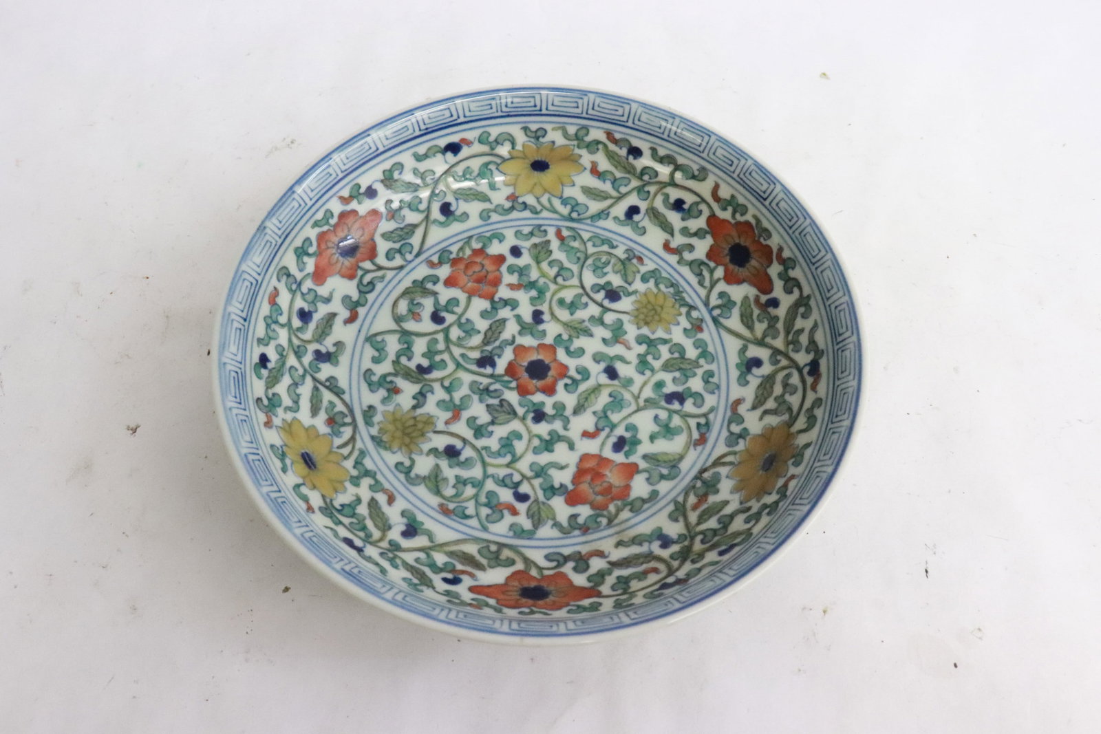 A doucai porcelain small plate: A doucai porcelain small plate, 1.4"x5.95"dia