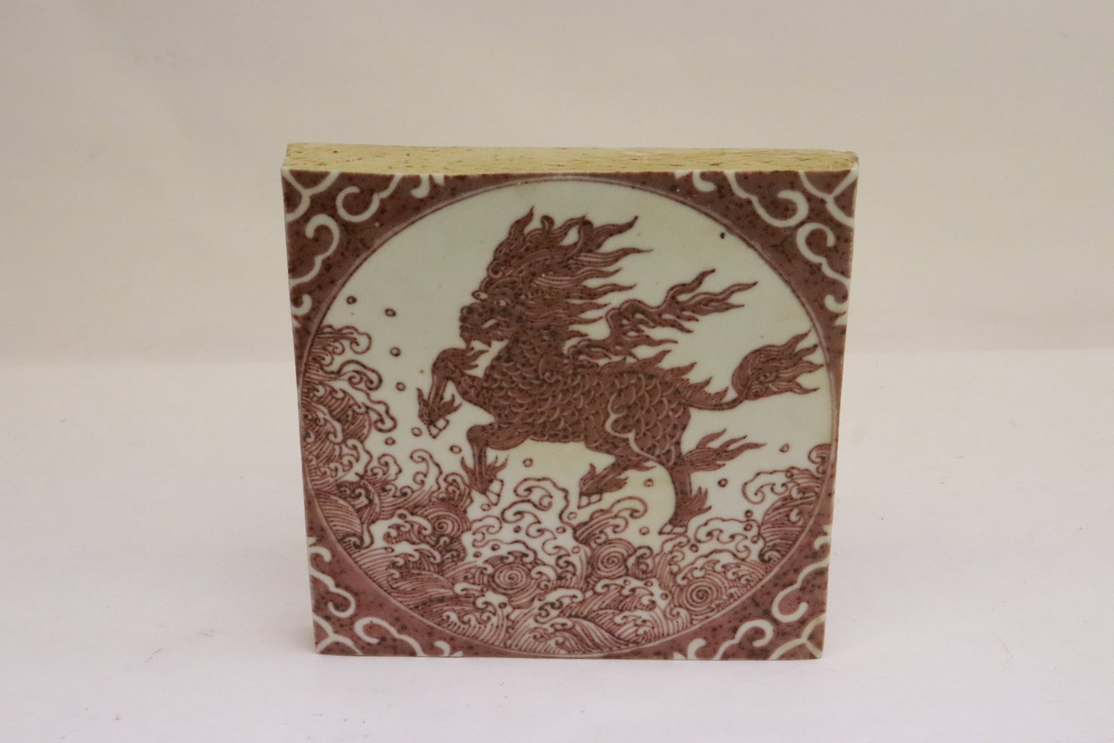 A vintage red and white earthenware tile (1 of 5)