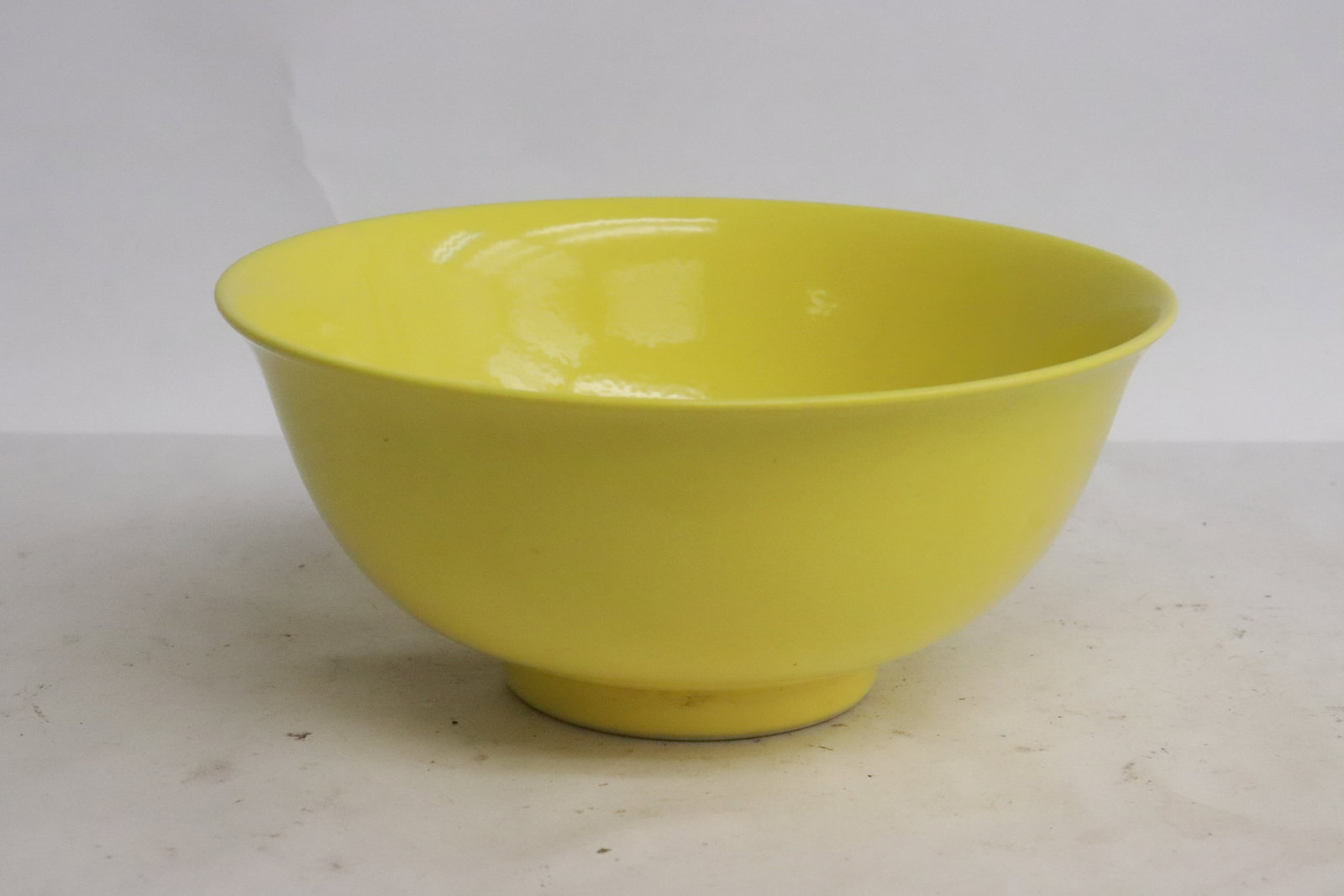Fine yellow glazed porcelain bowl: Fine yellow glazed porcelain bowl, 2.65"x5.75"dia
