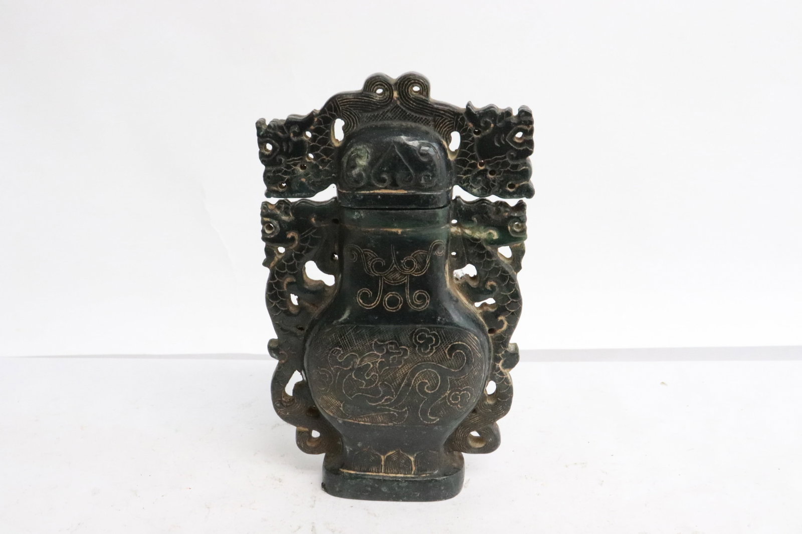 A green jade carved vase in archaic bronze motif (1 of 6)
