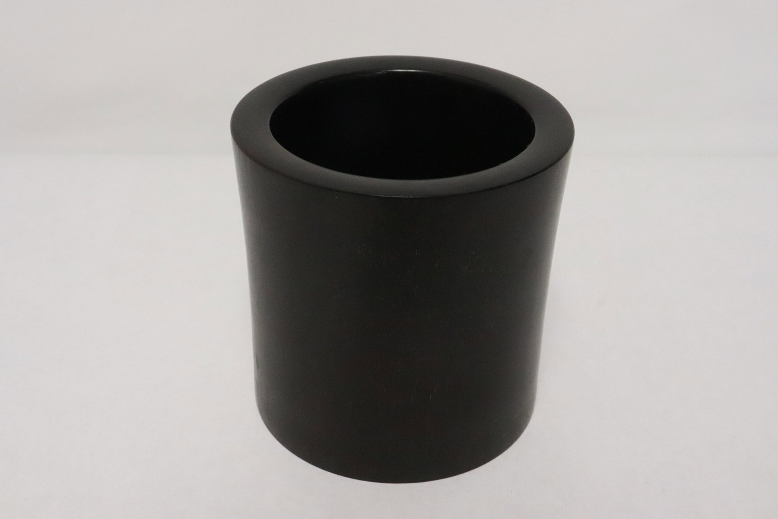 A wood carved brush holder: A wood carved brush holder, 4.15"x4"dia