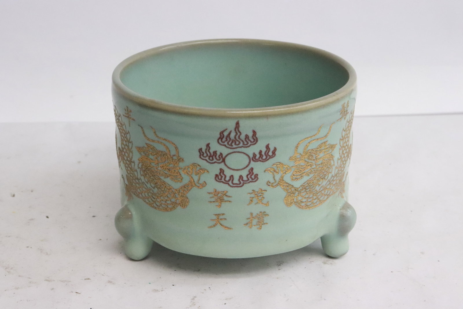 A celadon tripod censer: A celadon tripod censer, 2.85"x4.2"dia