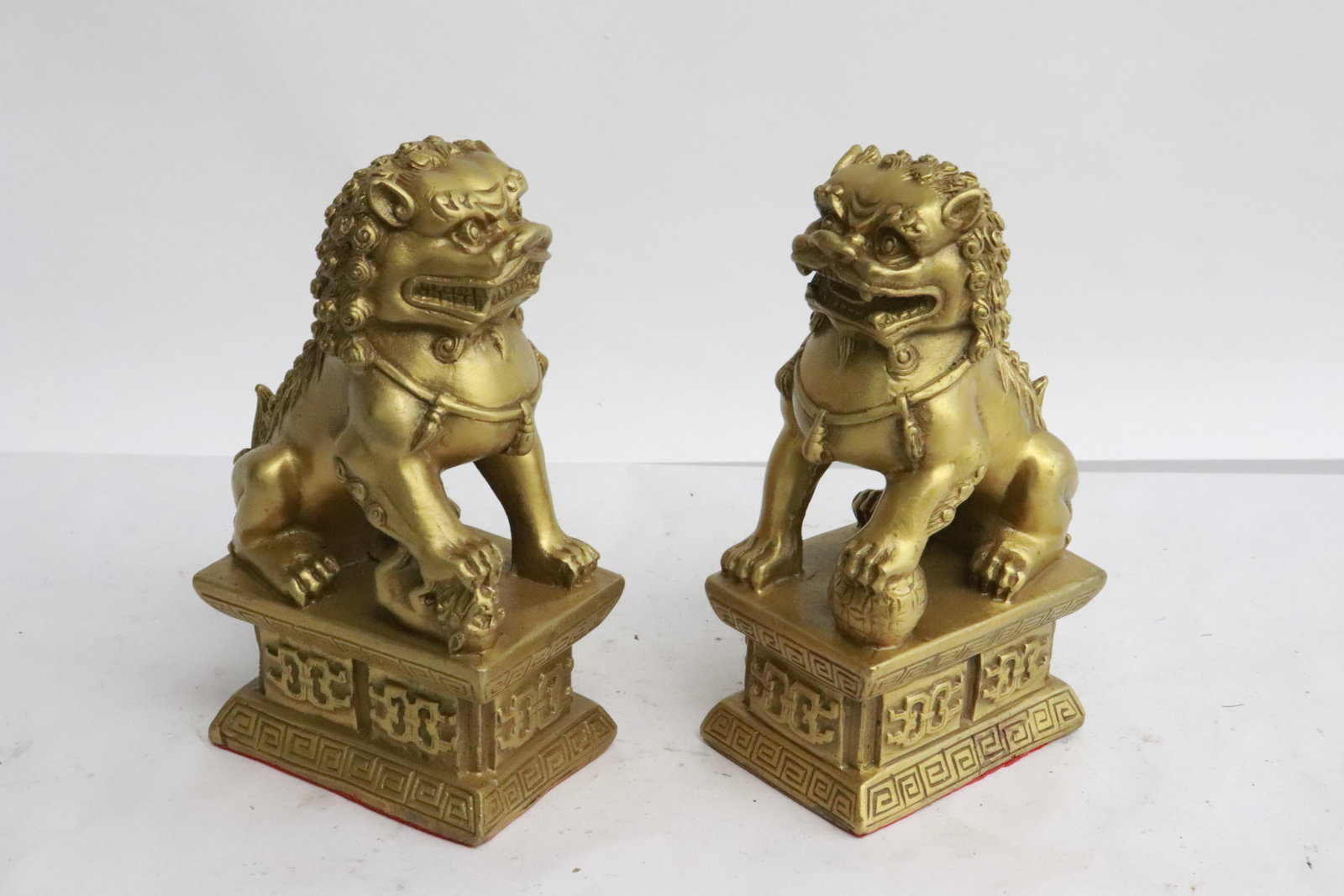 Pair metal sculpture of fulions: Pair metal sculpture of fulions, 5.65"H ea