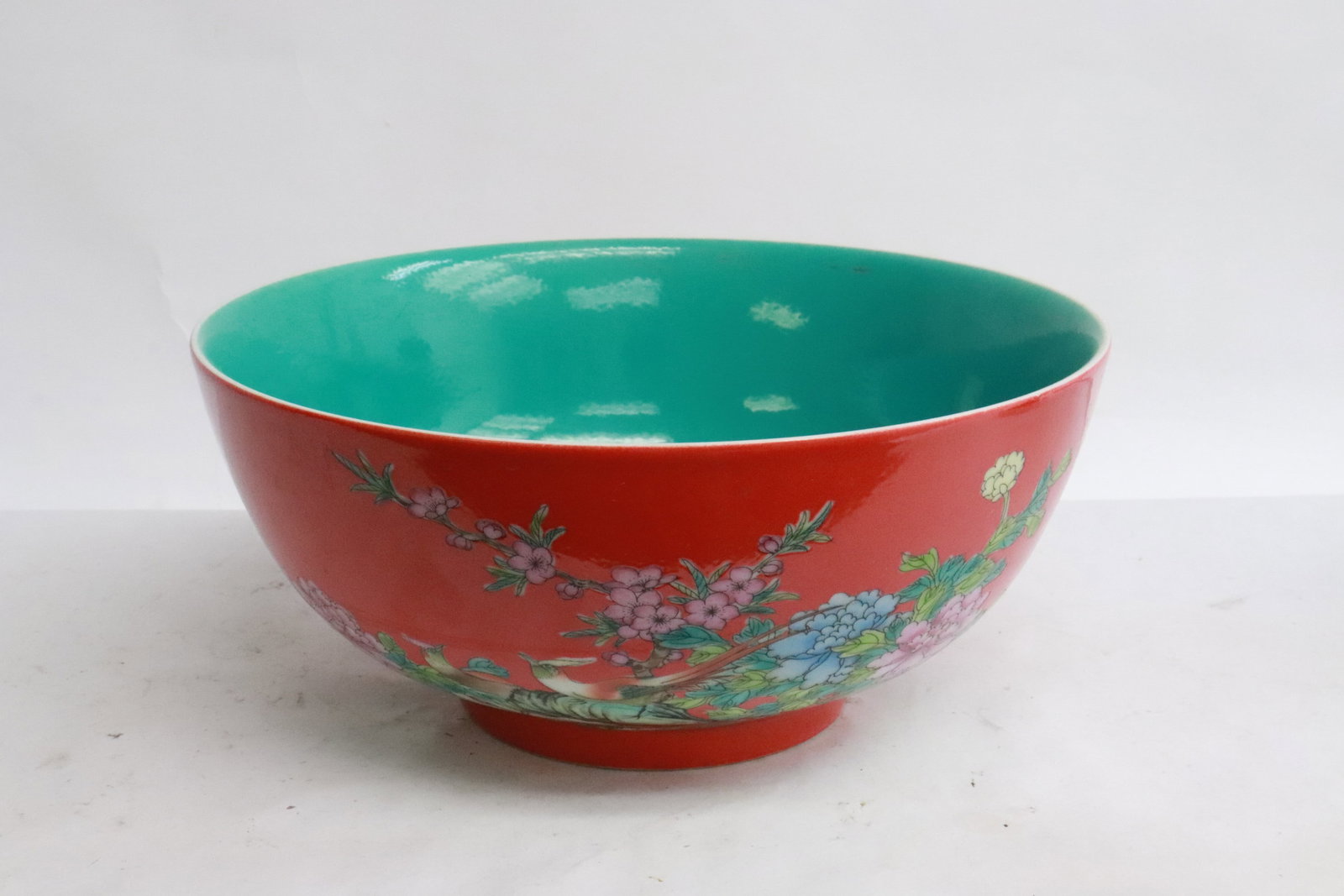 Large Chinese red background porcelain bowl: Large Chinese red background famille rose porcelain bowl, 3.85"x8.6"dia