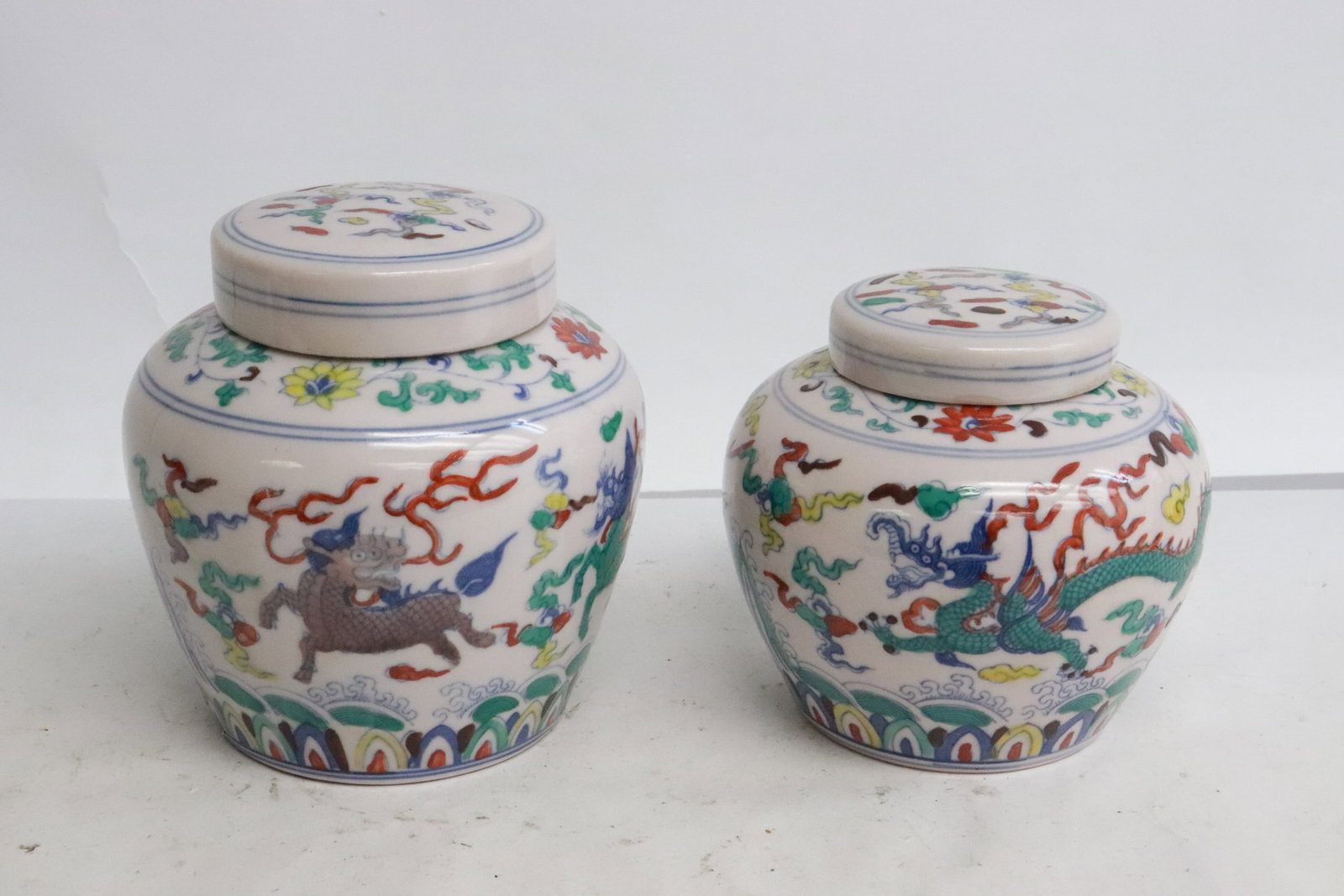 2 wucai porcelain covered tea caddies (1 of 8)
