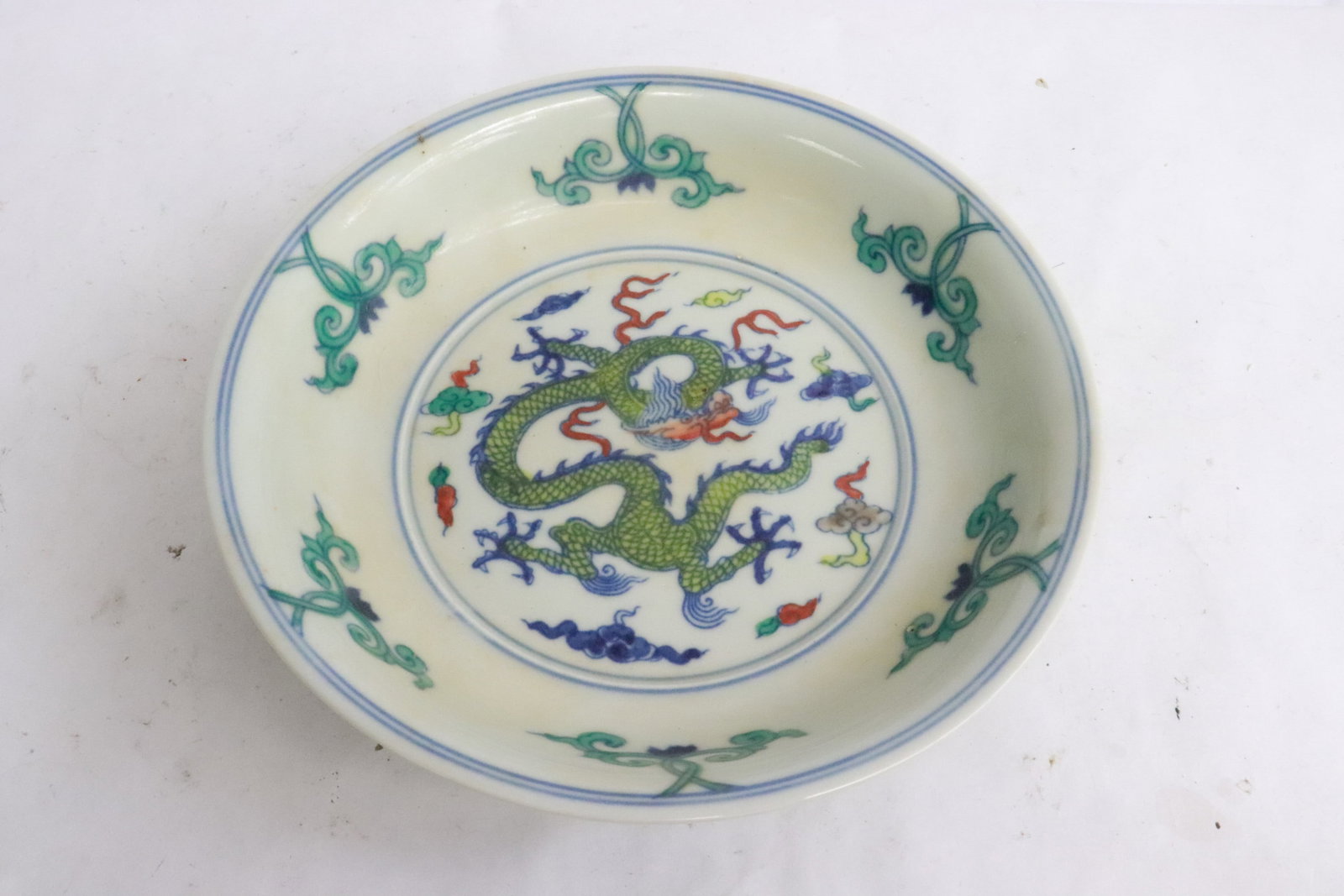 A doucai porcelain plate: A doucai porcelain plate, 1.63"x6.6"dia
