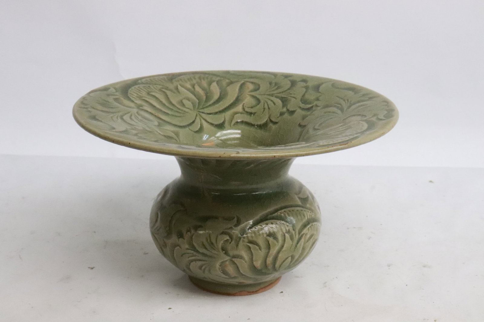 A celadon jar with incised decoration (1 of 5)