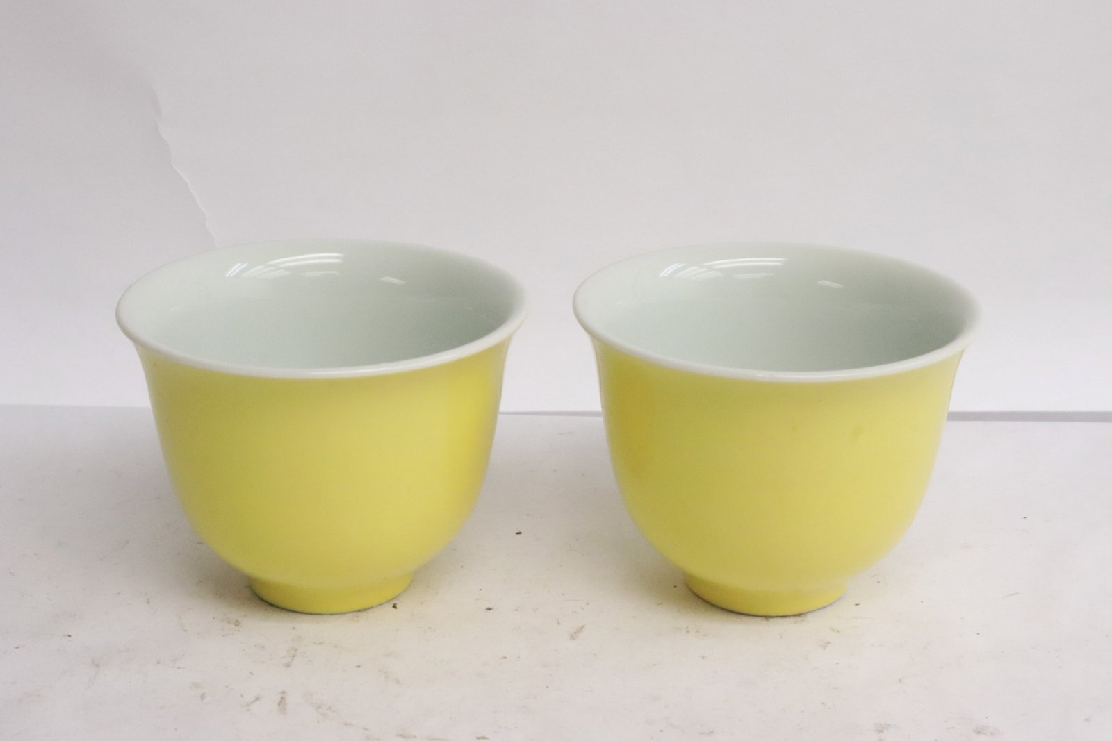Pair Chinese yellow glazed porcelain tea cups (1 of 4)