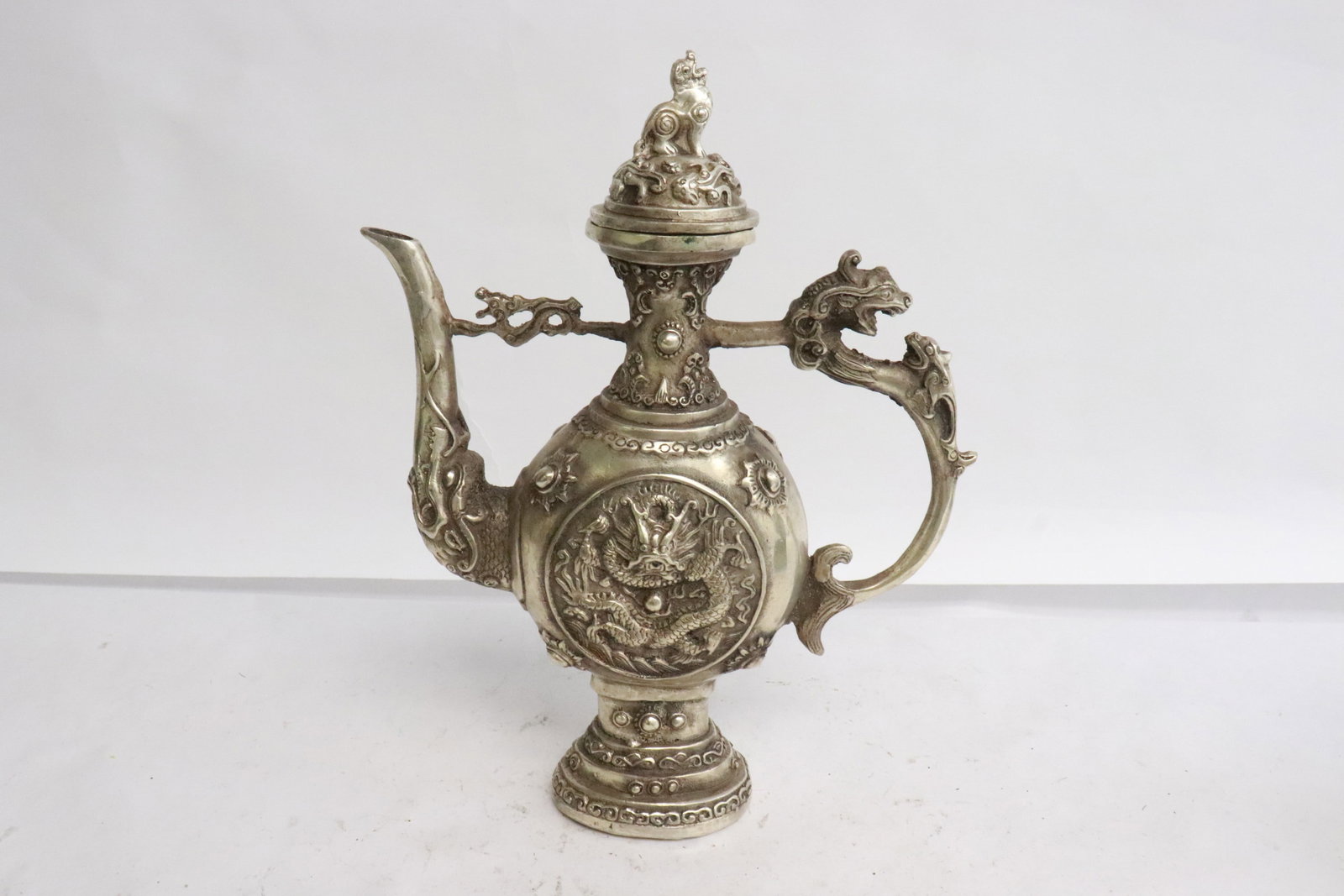A white bronze wine server - 3