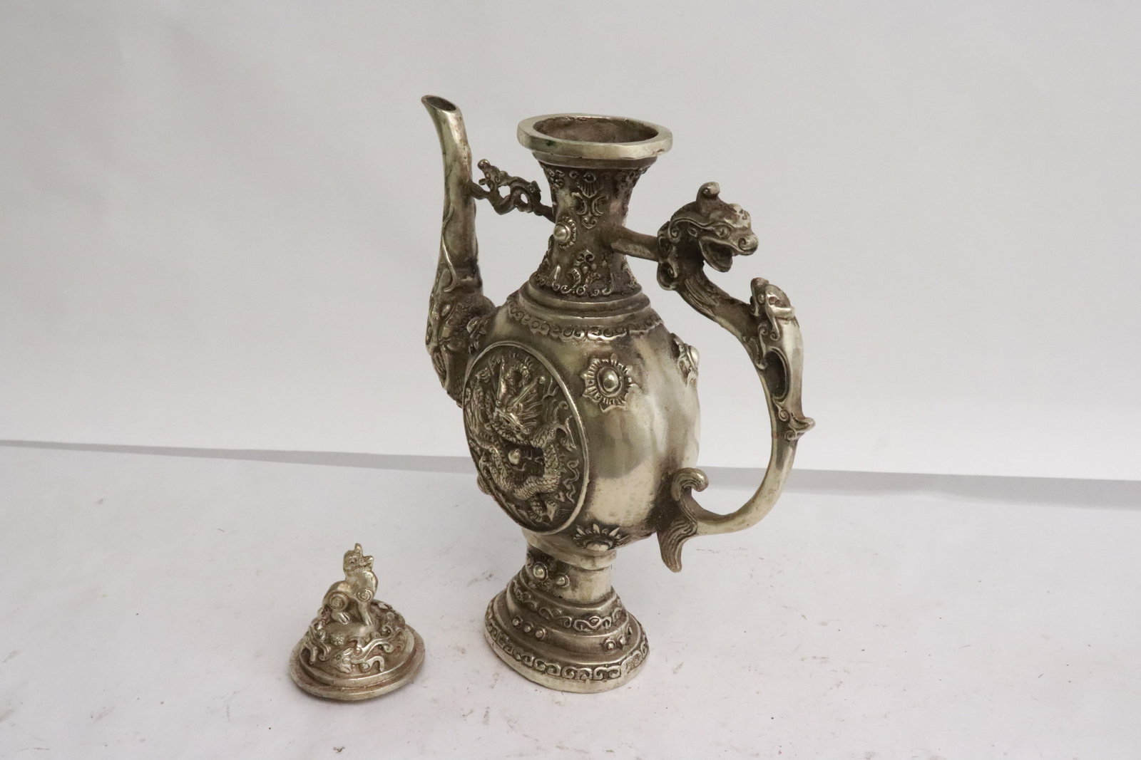 A white bronze wine server - 5