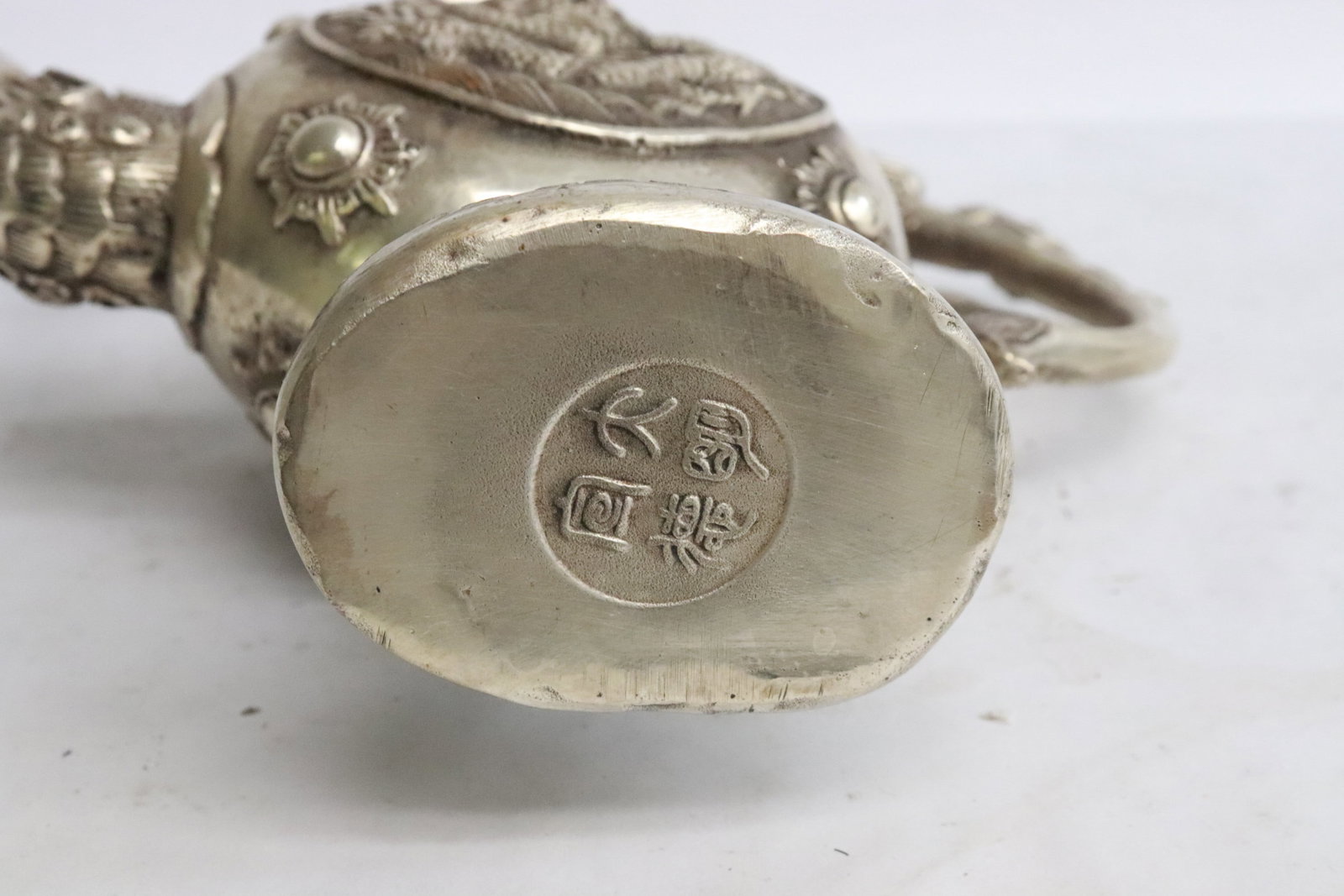 A white bronze wine server - 6
