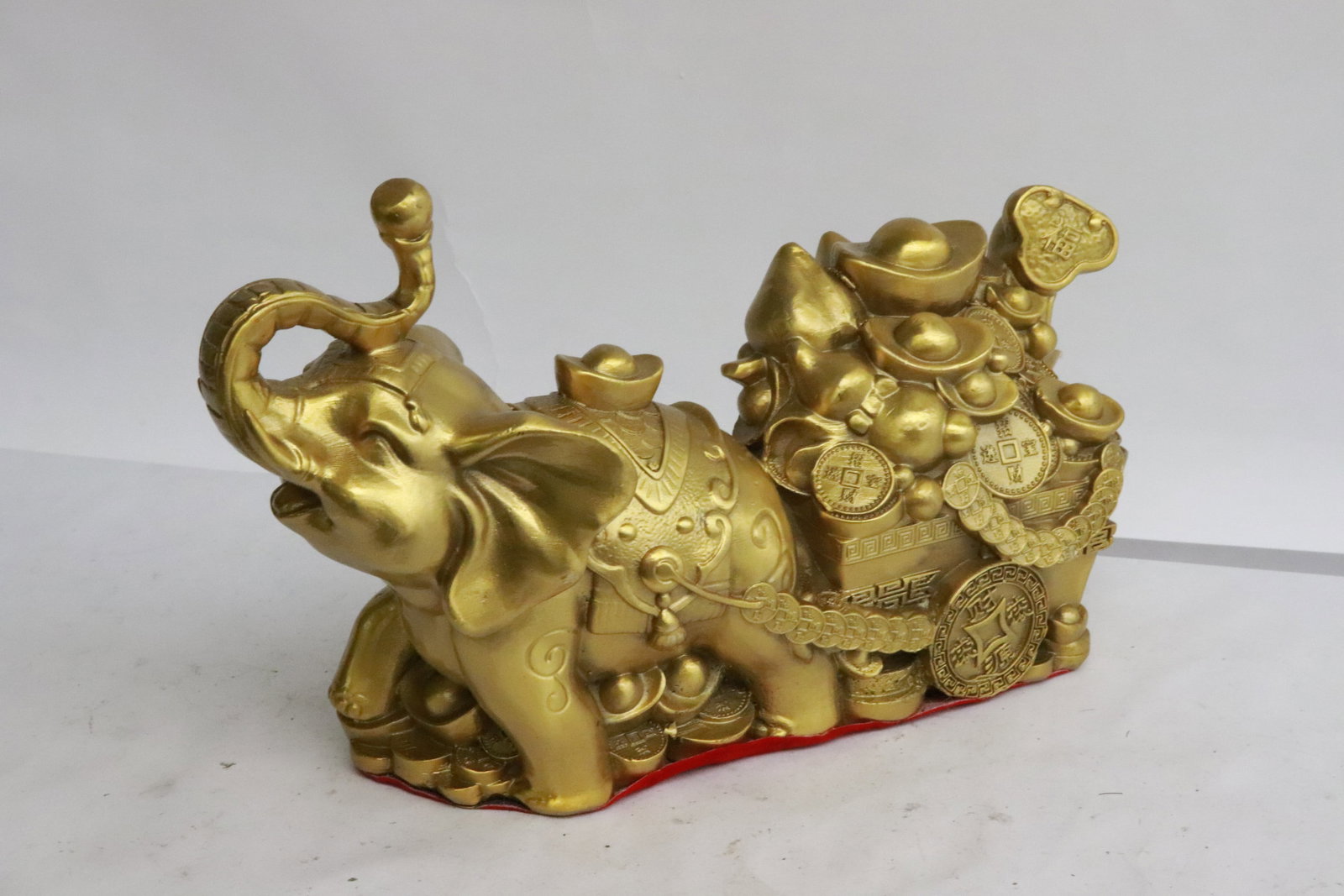 Gilt metal carving to depict elephant: Gilt metal carving to depict elephant, 5.75"H