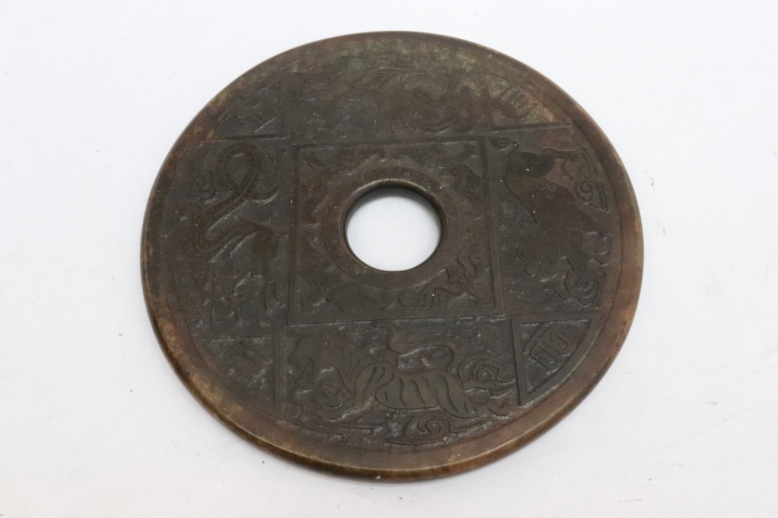 2 large jade like discs - 2